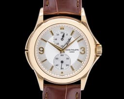 Travel Time 18K Yellow Gold Manual Wind Deployant