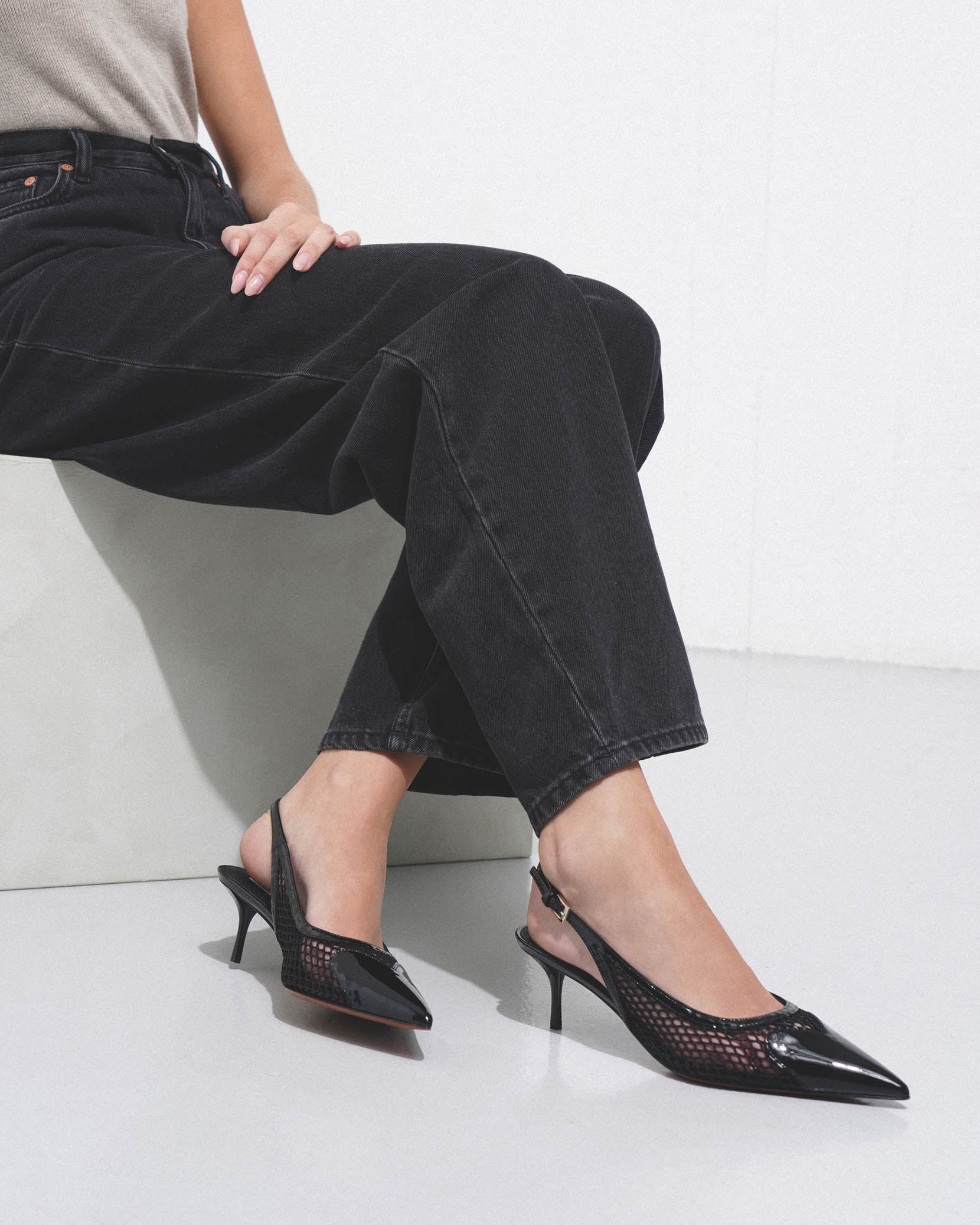 Coeur 55 black patent mesh slingback pumps