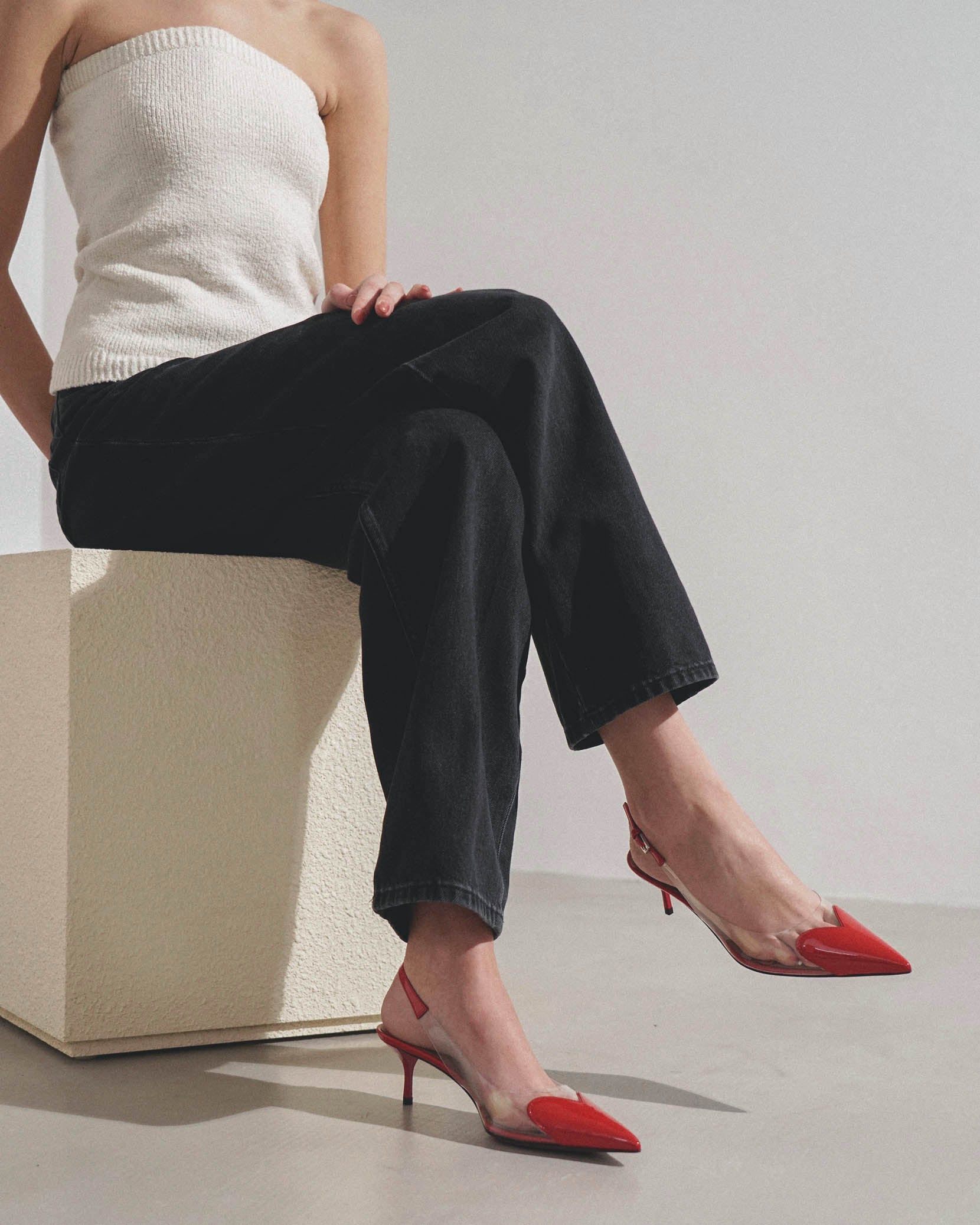 Coeur 55 red patent slingback pumps