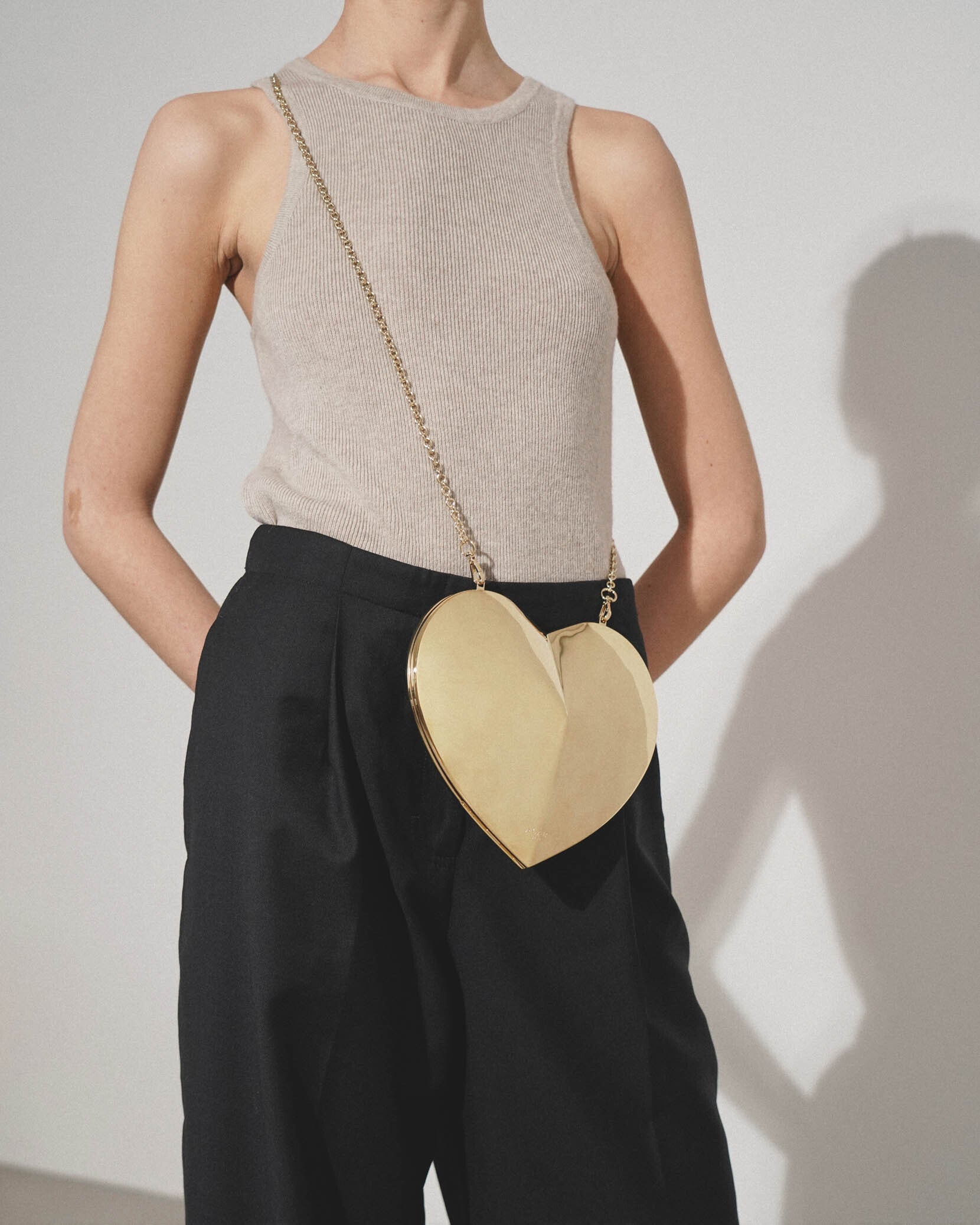 Le Coeur gold metal crossbody bag