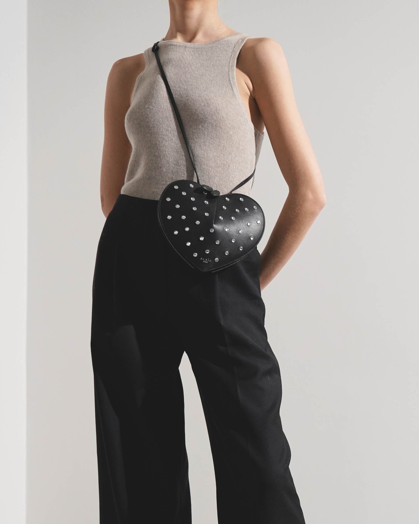 Le Coeur black studded leather crossbody bag