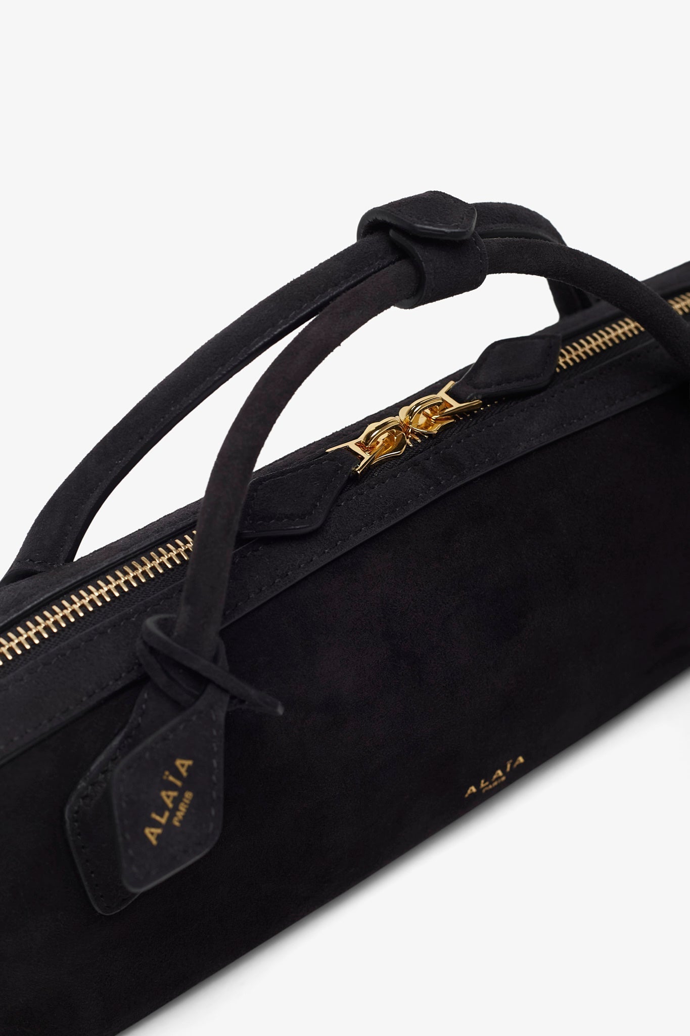 Le Teckel black suede clutch