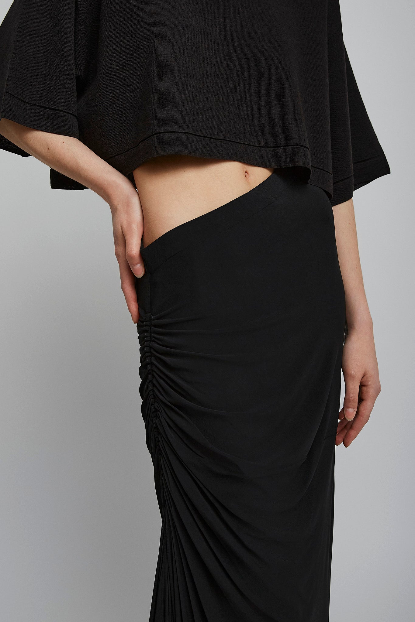Soft jersey draped black skirt