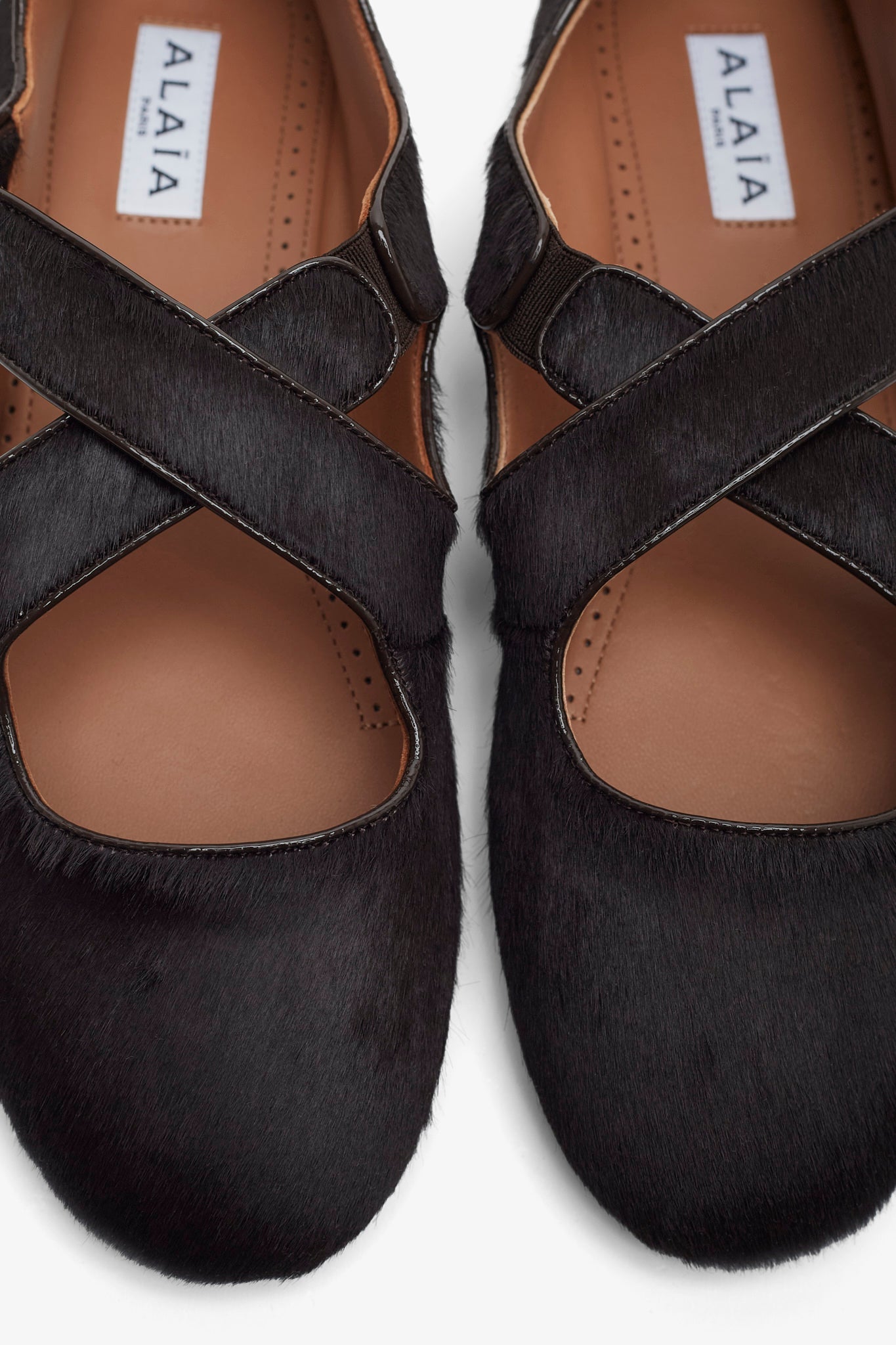 Criss cross brown ballet flats