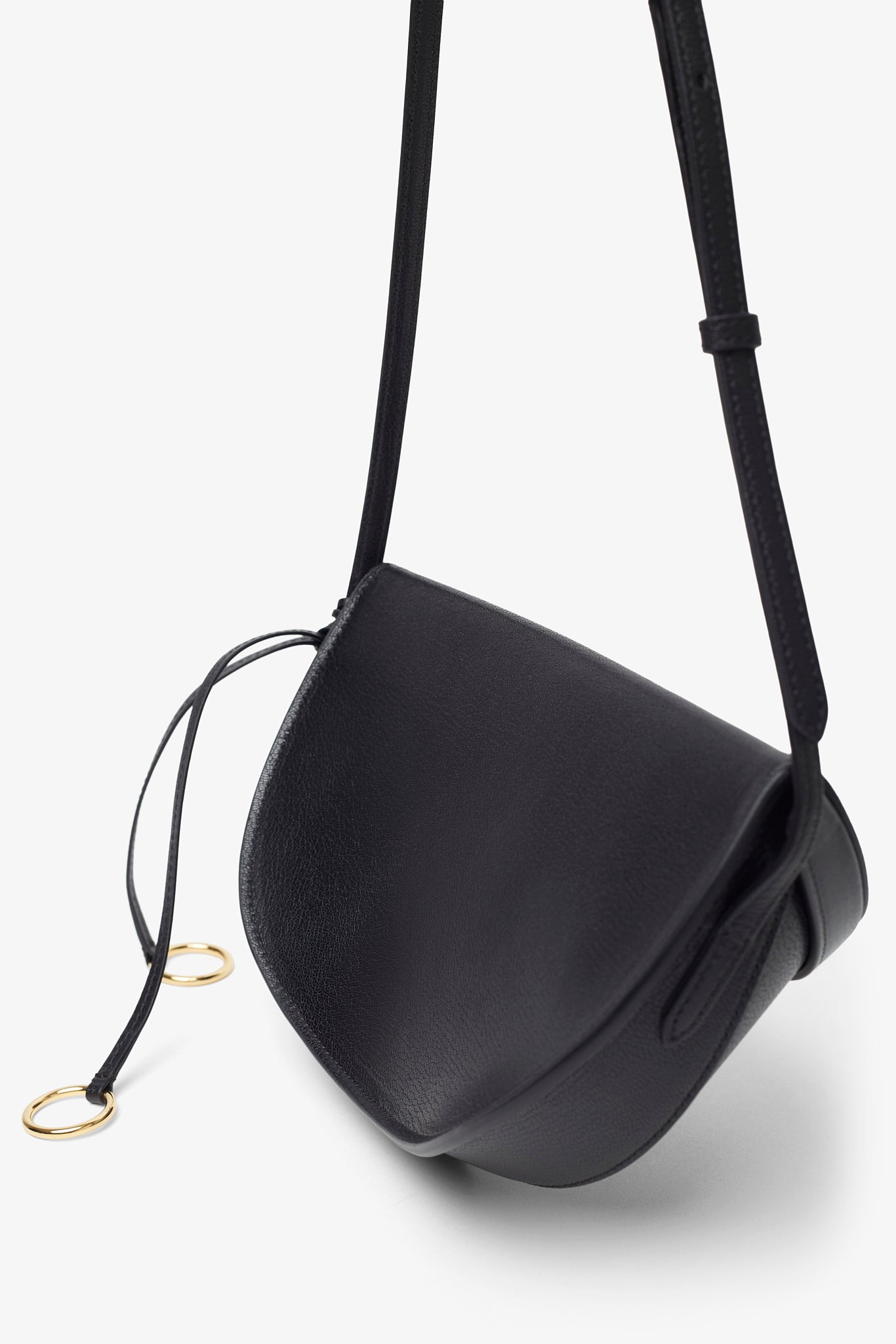 Hip east west black leather bag
