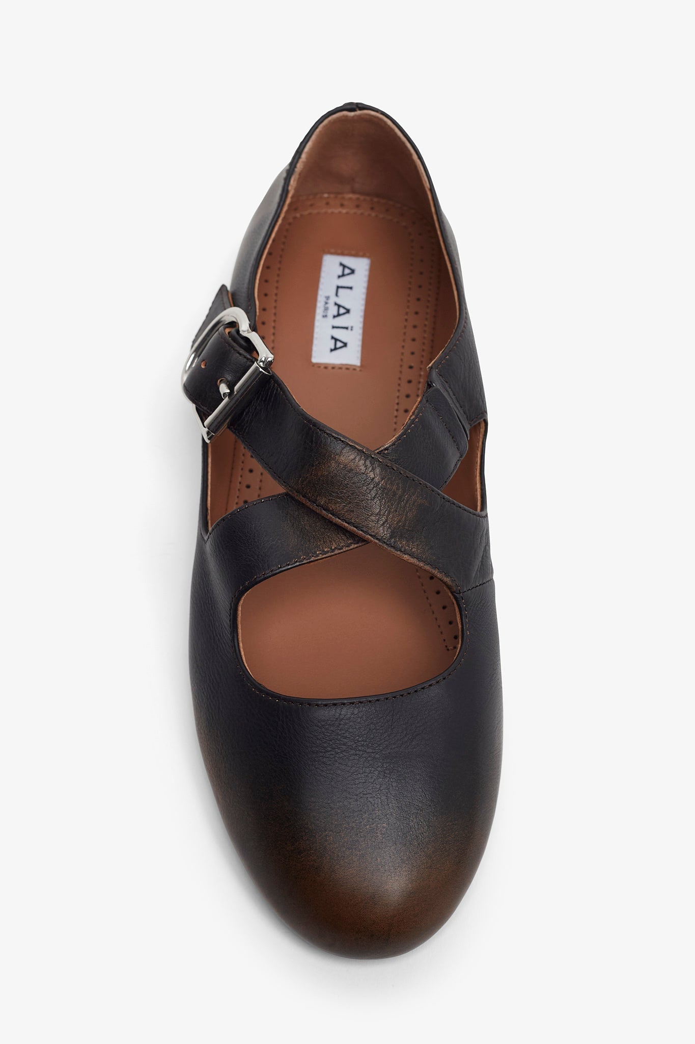 Criss cross brown ballet flats