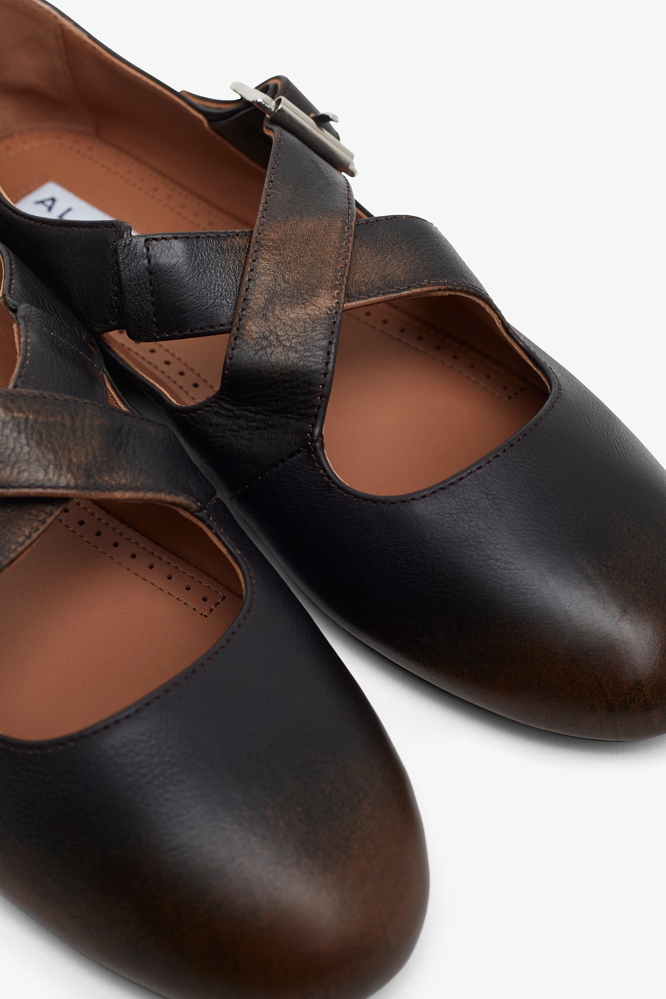 Criss cross brown ballet flats