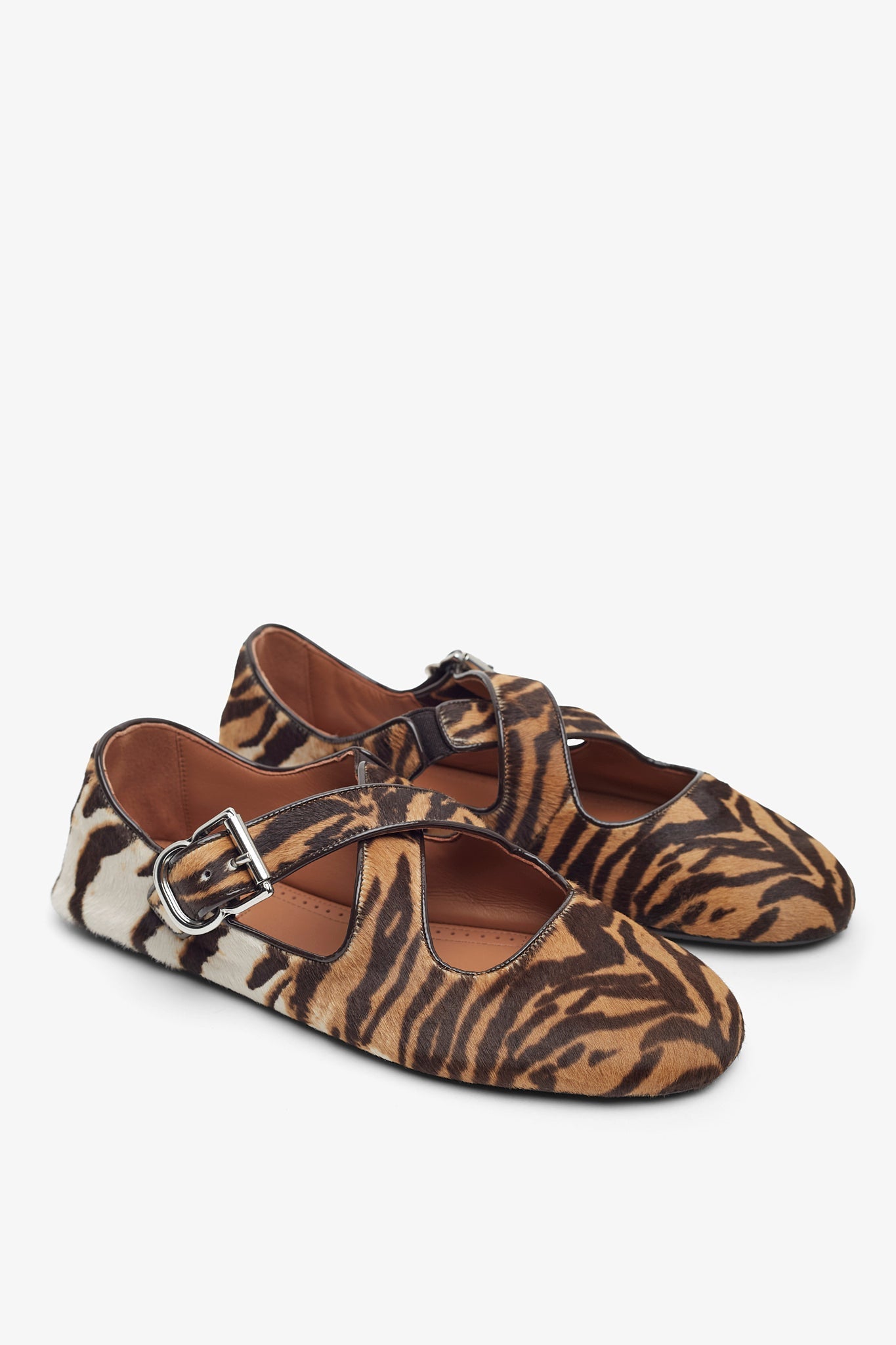 Criss cross brown and beige ballet flats