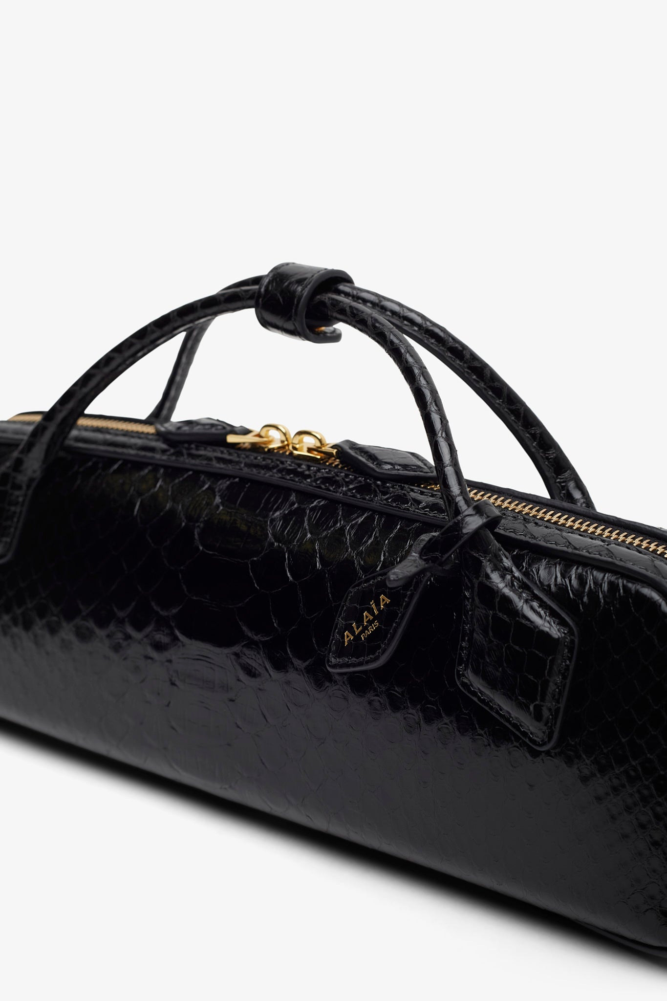 Le Teckel black clutch