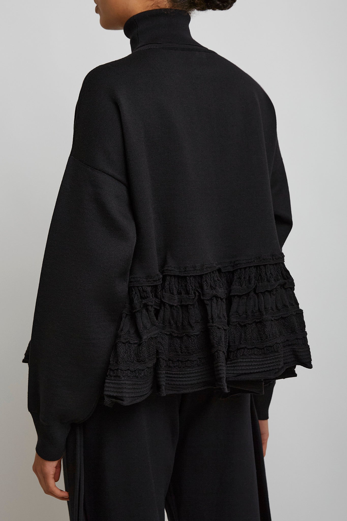 Alaia black peplum jumper