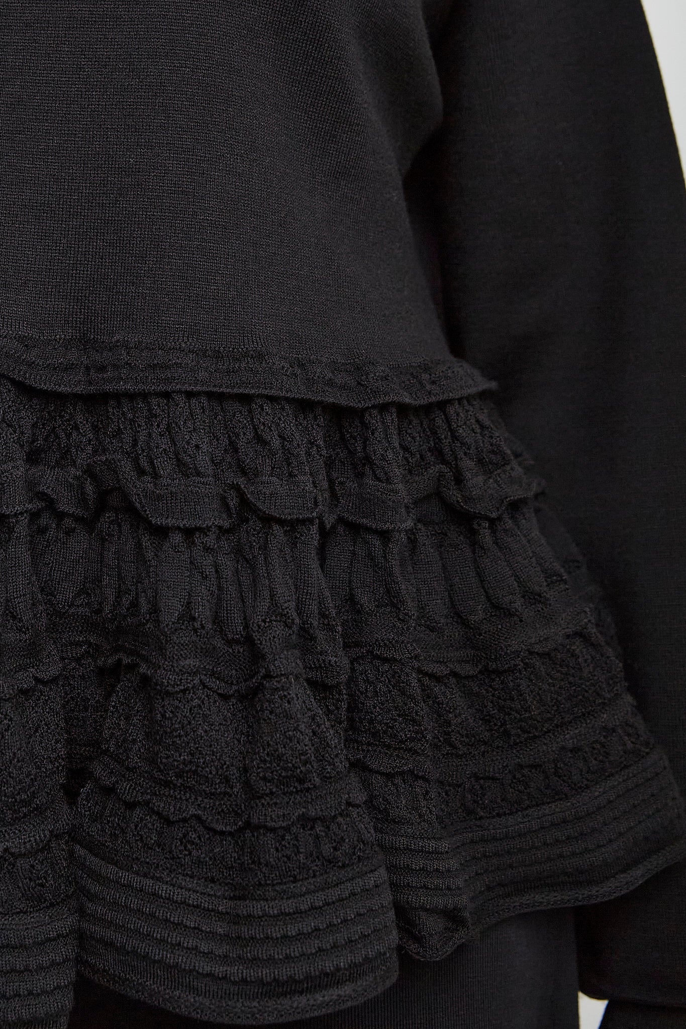 Alaia black peplum jumper