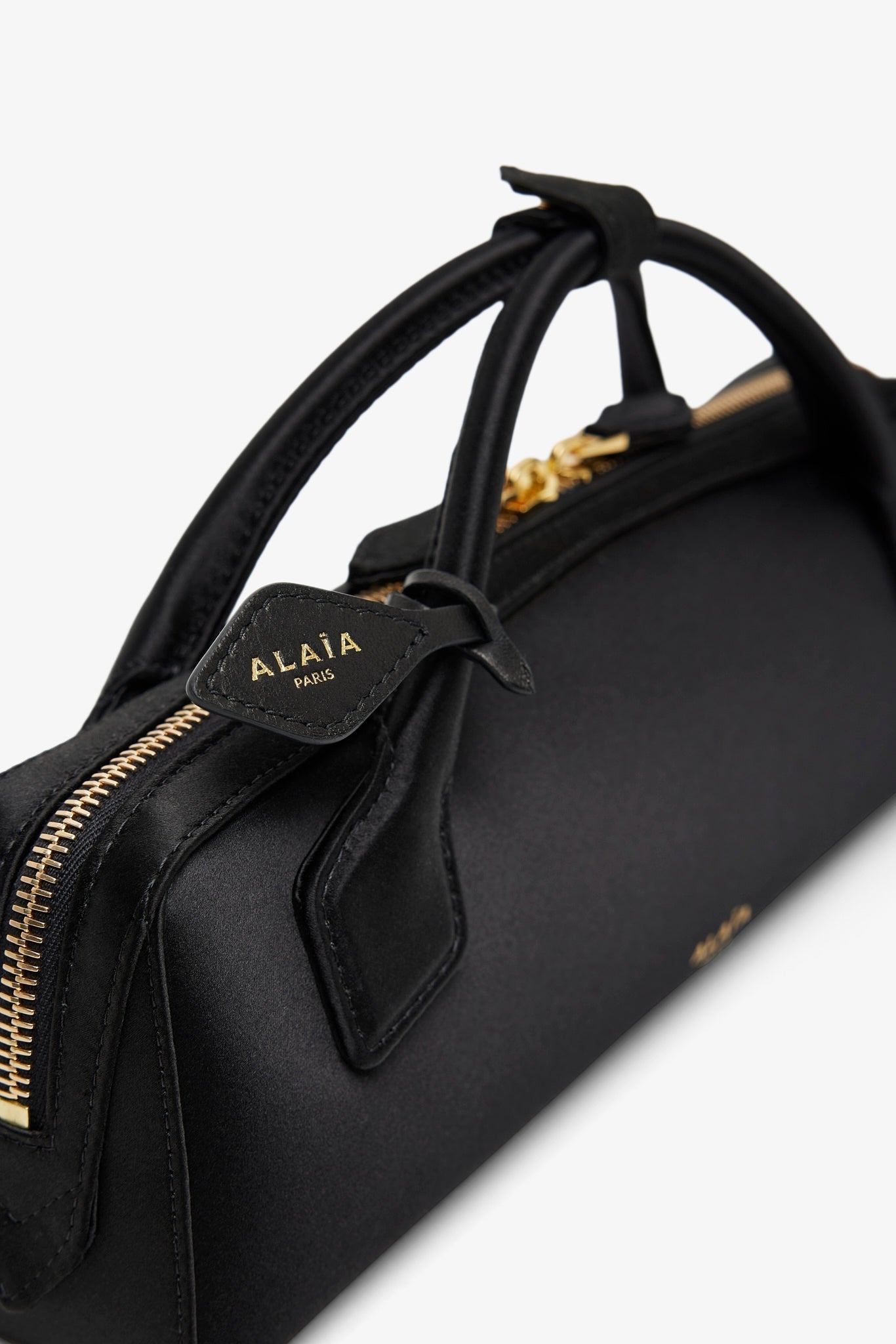 Le Teckel black clutch