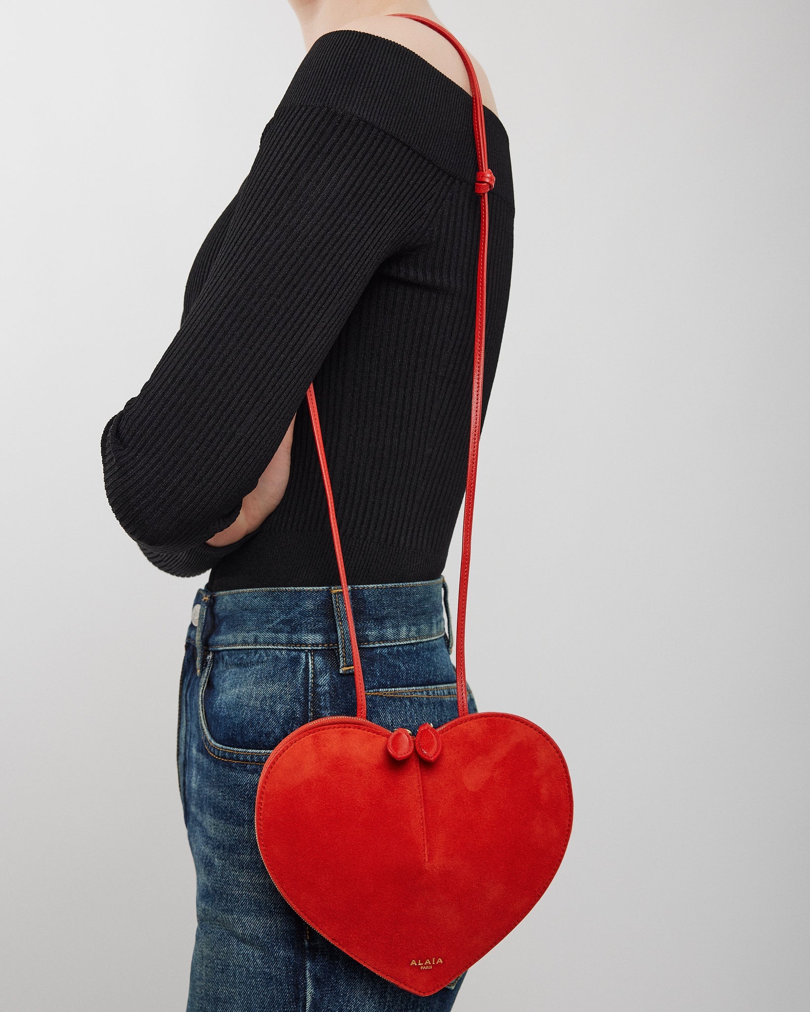 Le Coeur orange suede crossbody bag