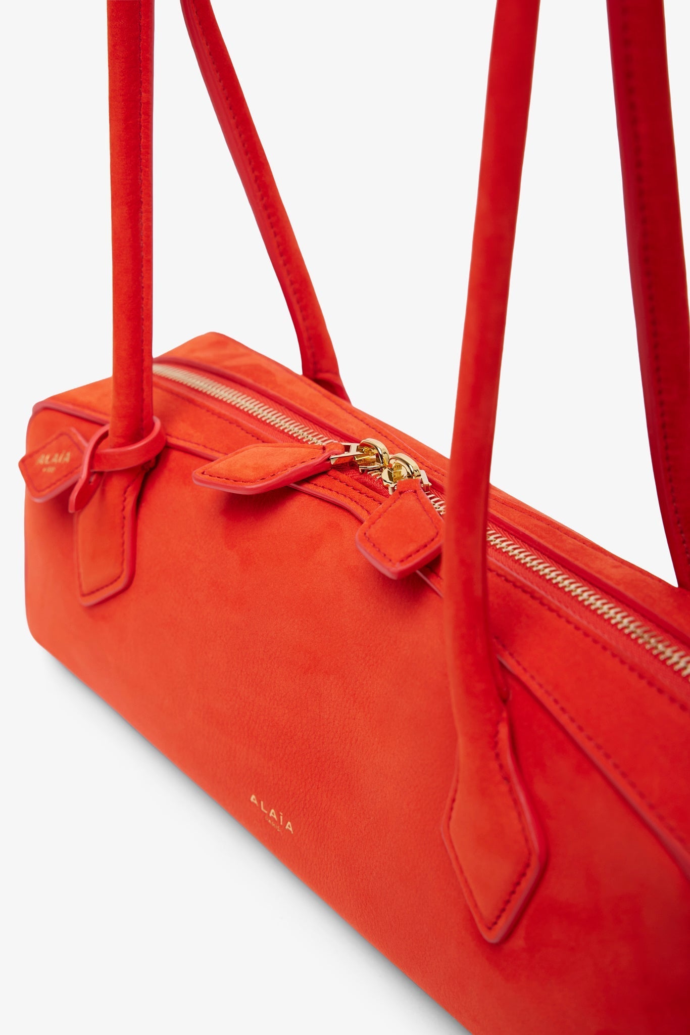Le Teckel Medium orange suede bag