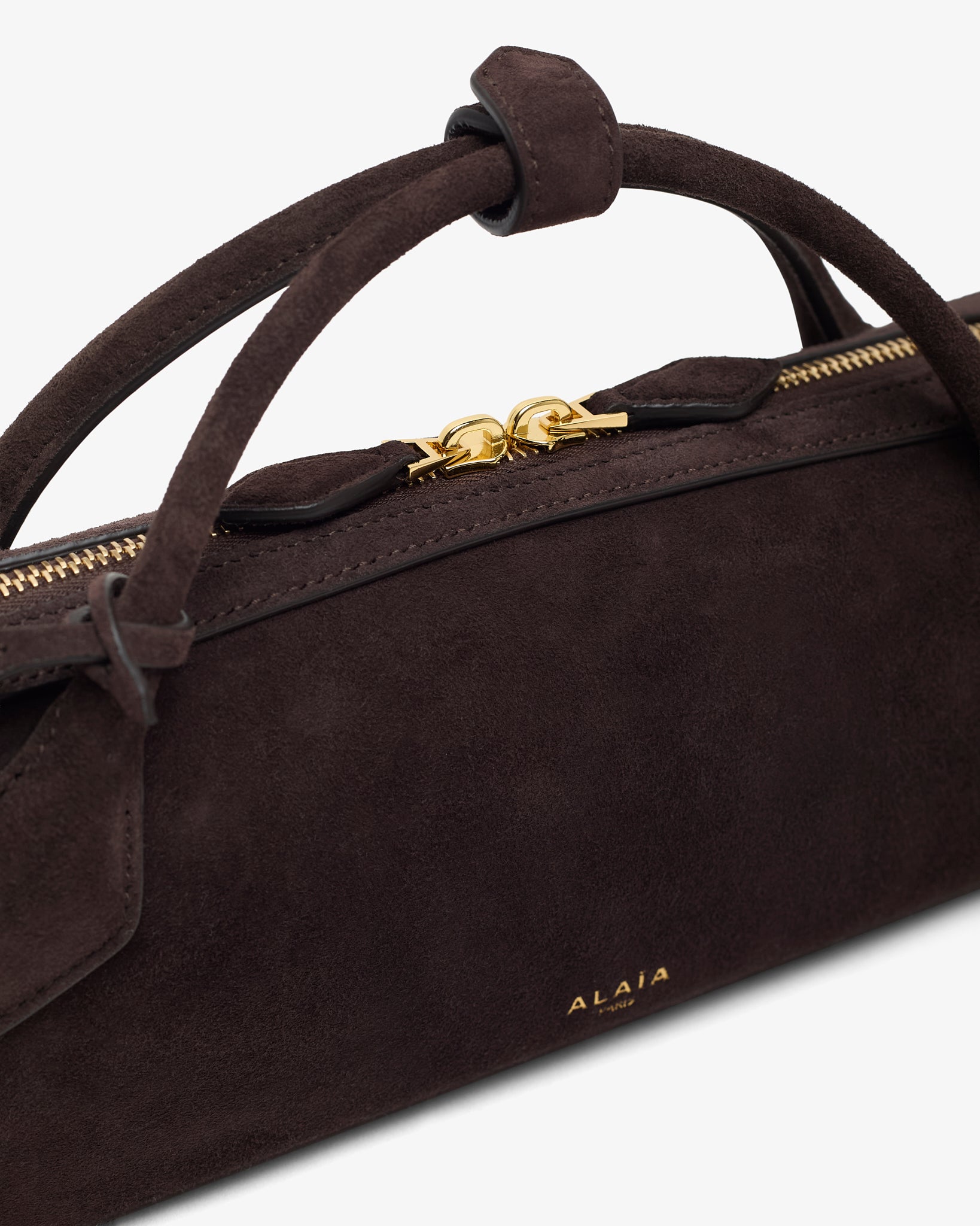 Le Teckel dark brown suede clutch