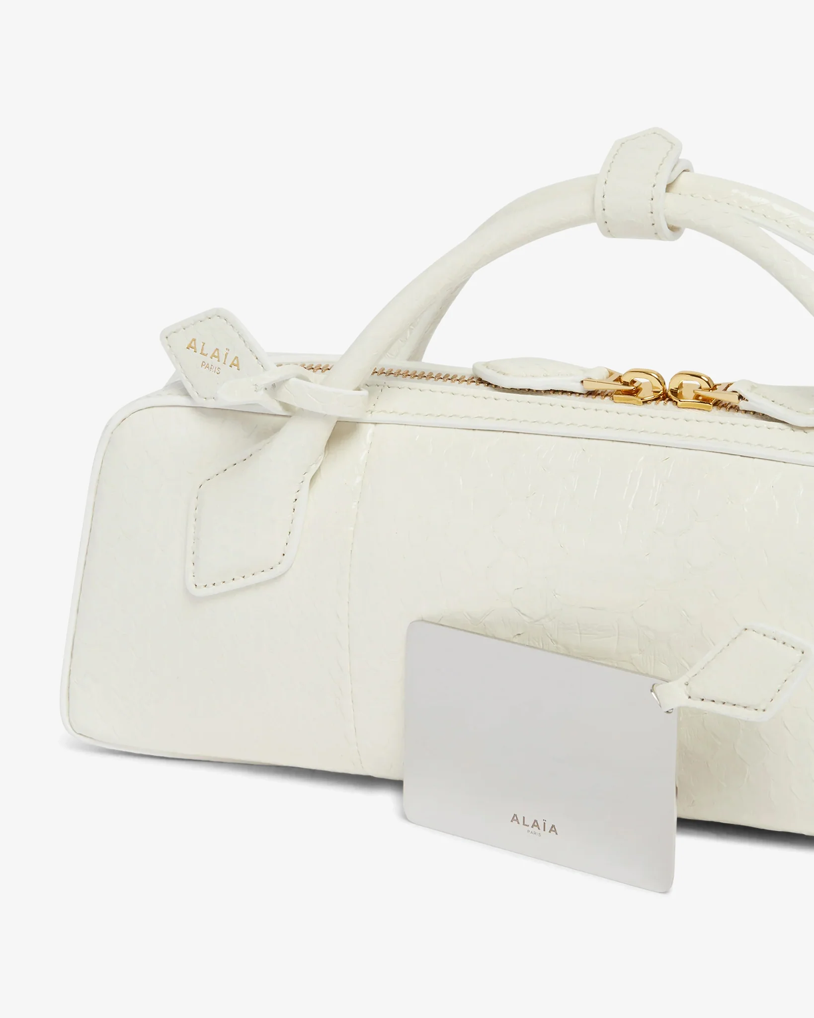 Le Teckel snow white clutch