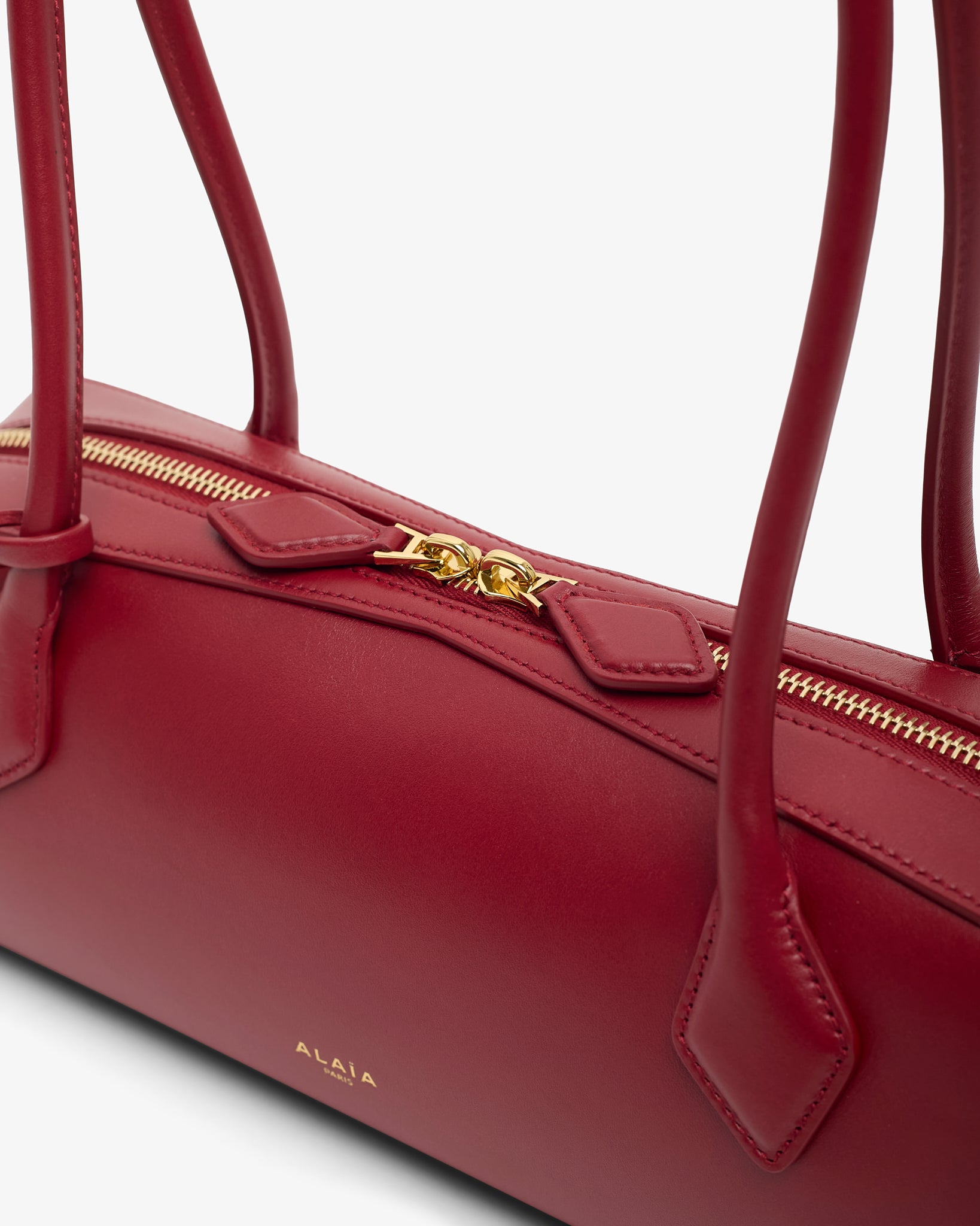 Le Teckel Medium red smooth leather bag