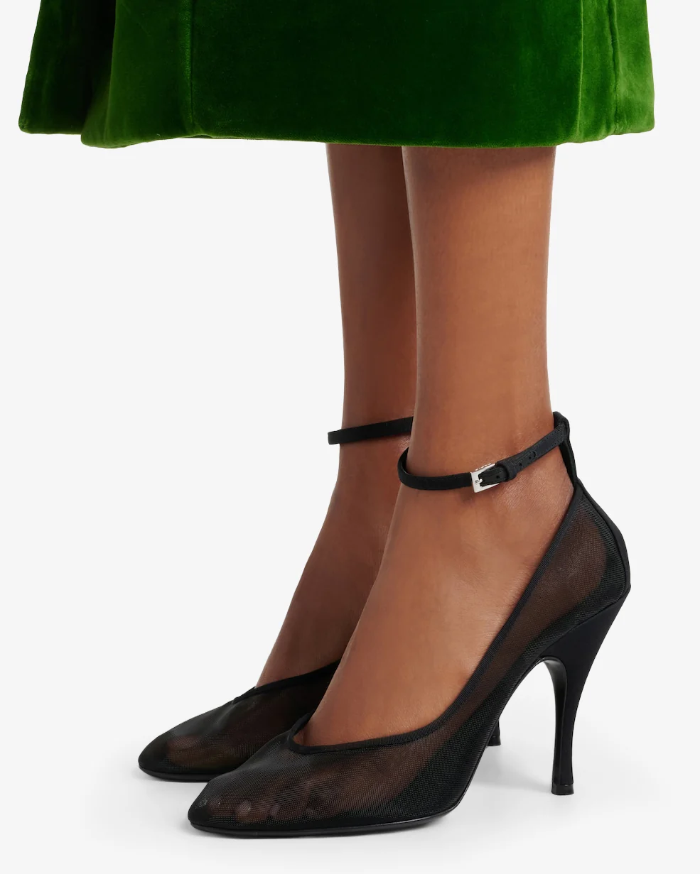 Transparent black strappy pumps