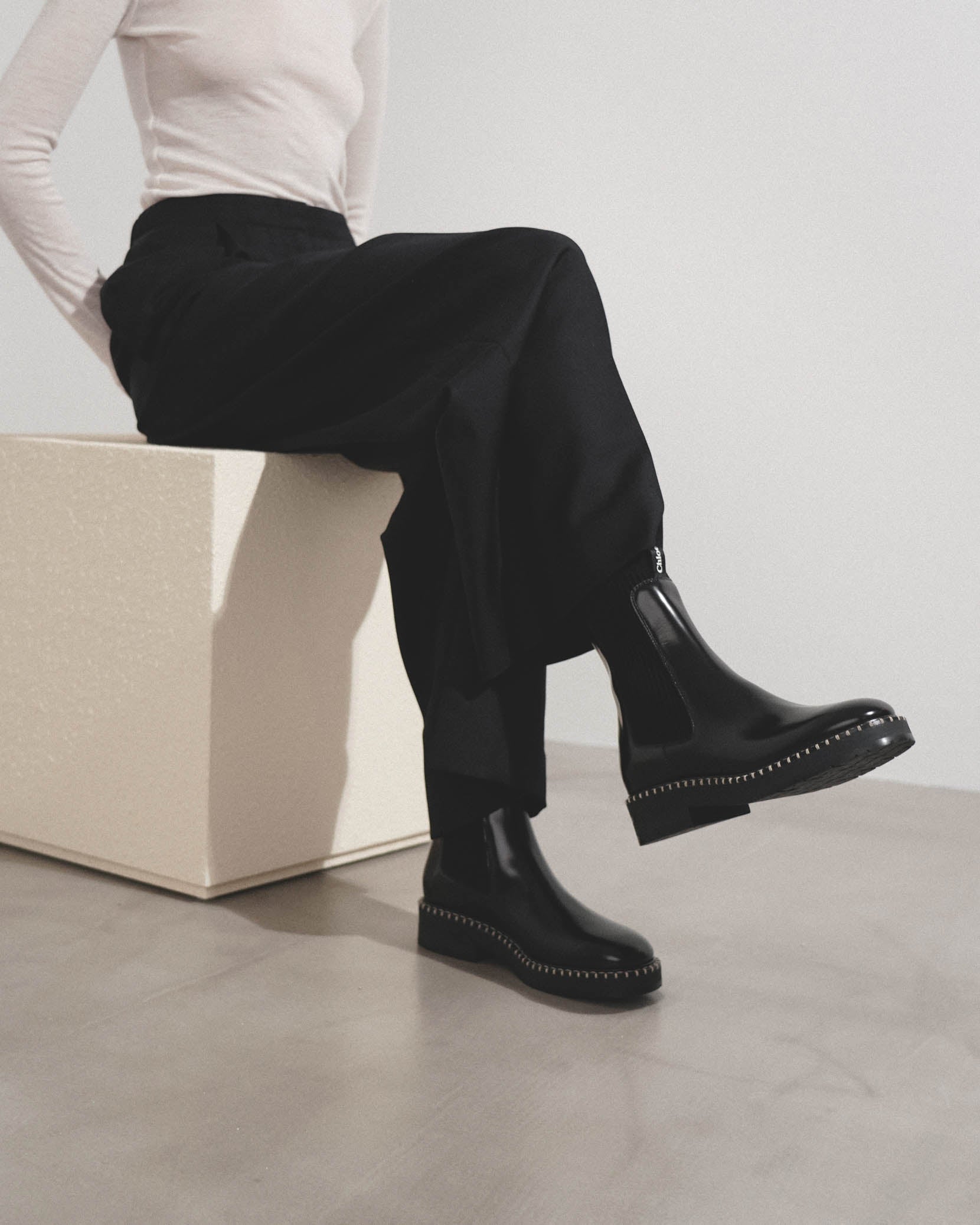Noua black leather ankle boots