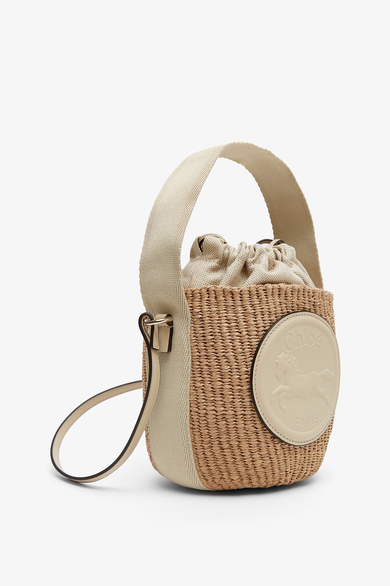 Horse medal ivory raffia bucket bag