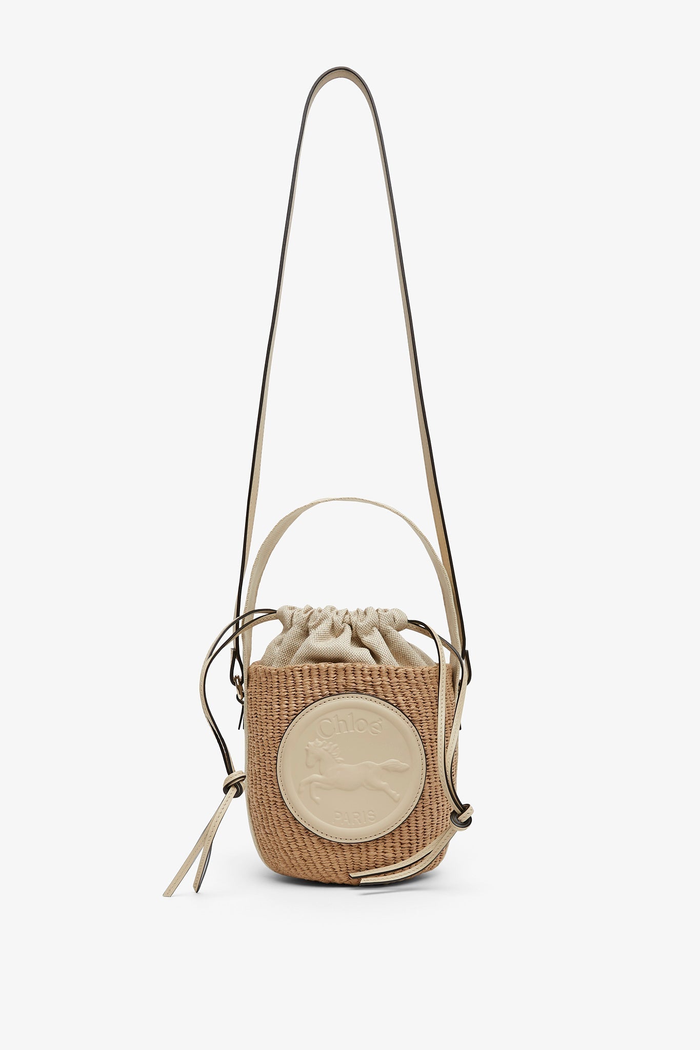 Horse medal ivory raffia bucket bag