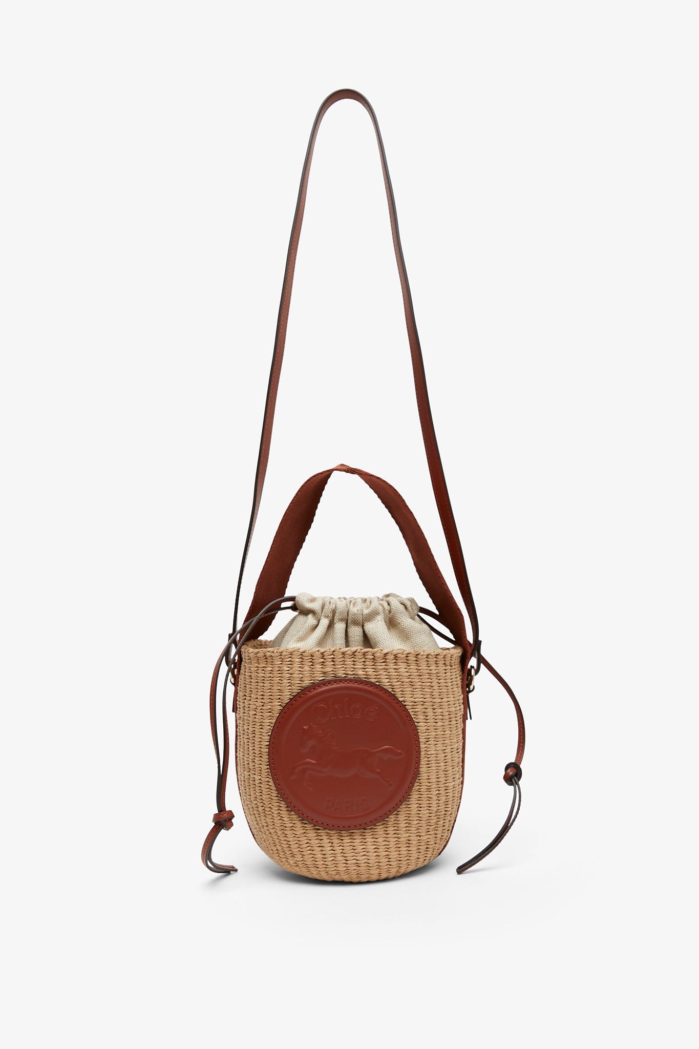 Horse medal brown raffia bucket bag