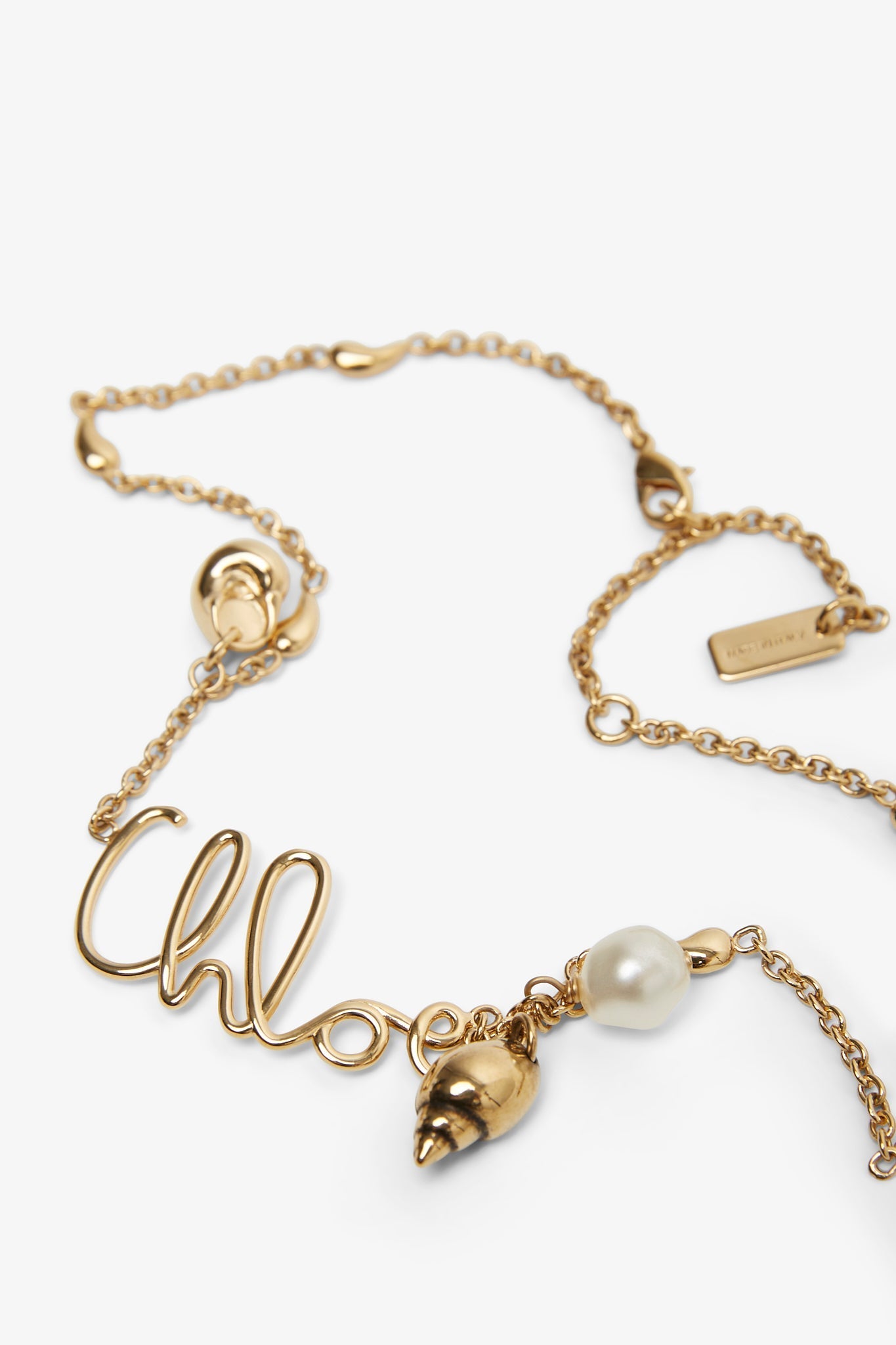 Shells necklace in vintage gold