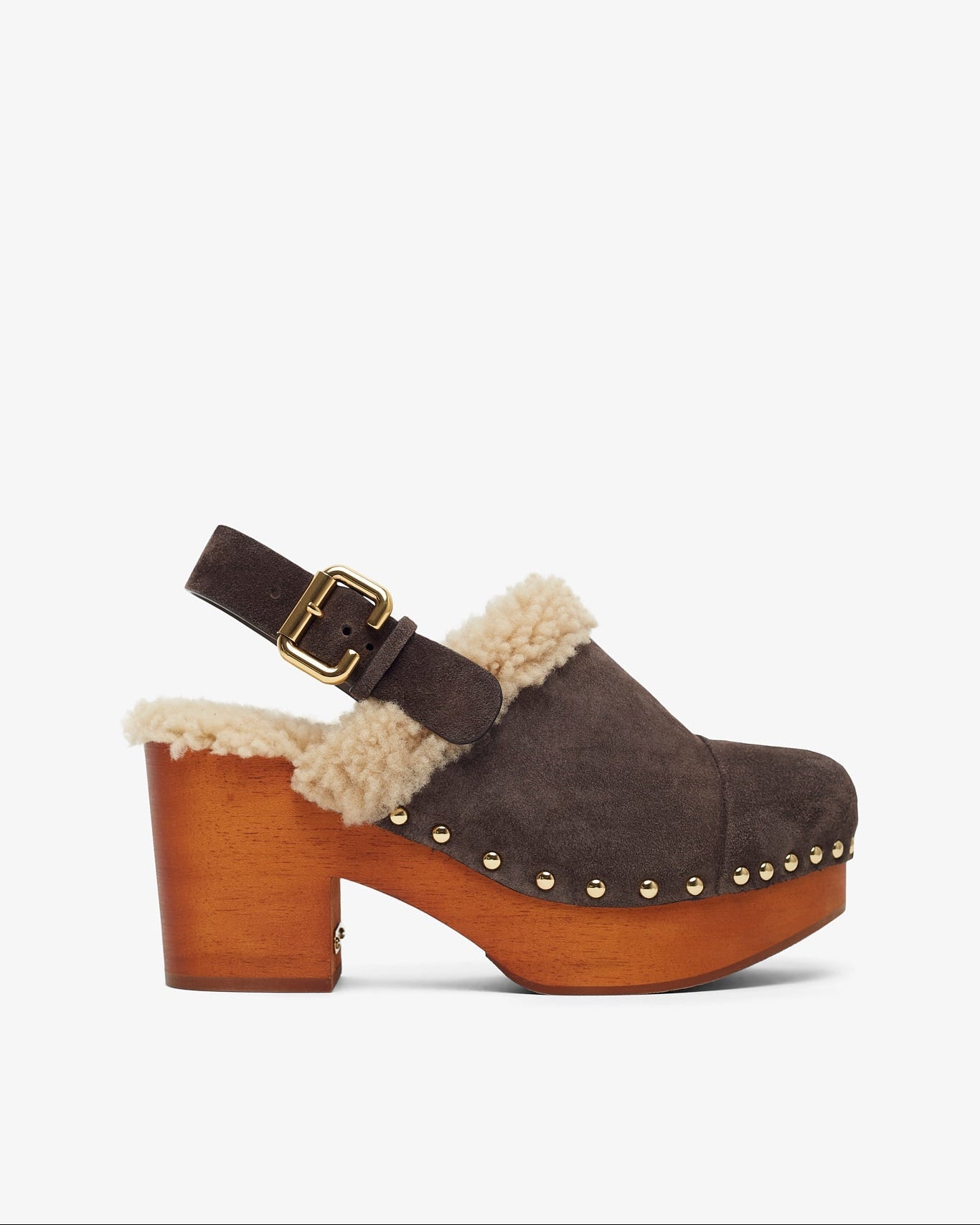 Brown suede clog with wooden sole and shearling trim on a white background