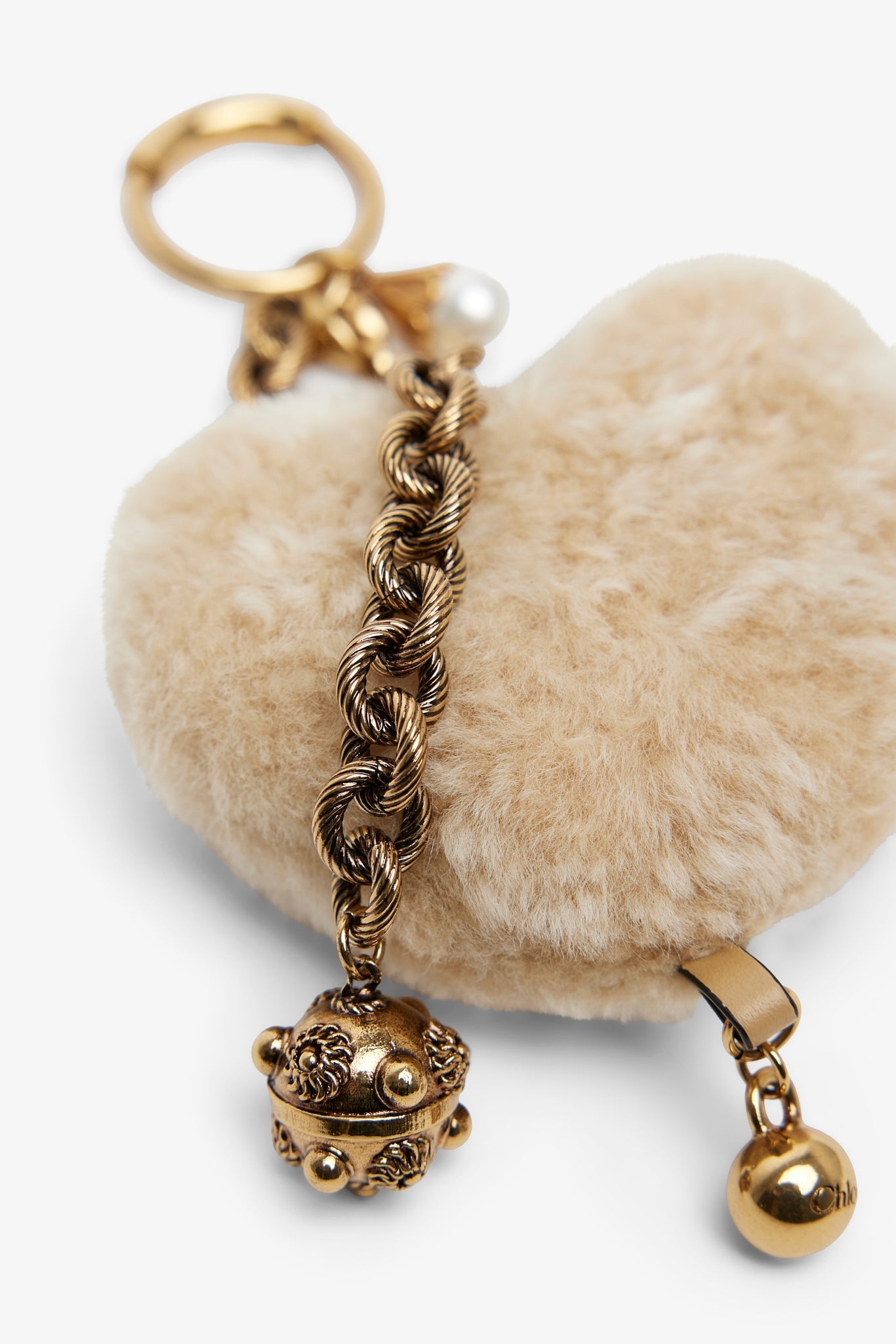 Beige shearling heart bag charm