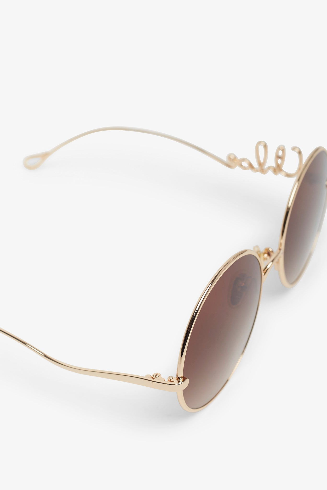 Round gold brown sunglasses