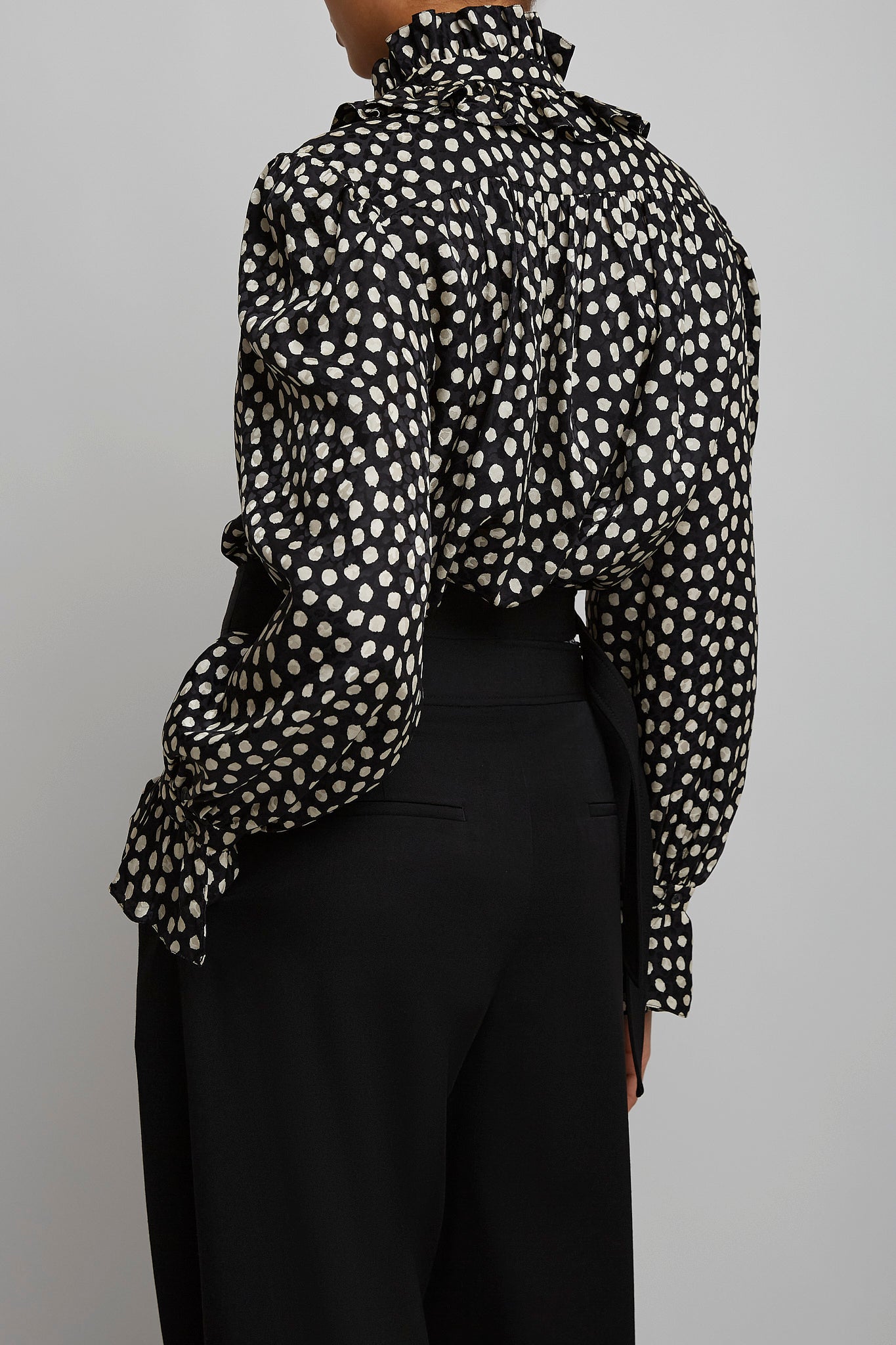 Polka dot high neck silk blouse