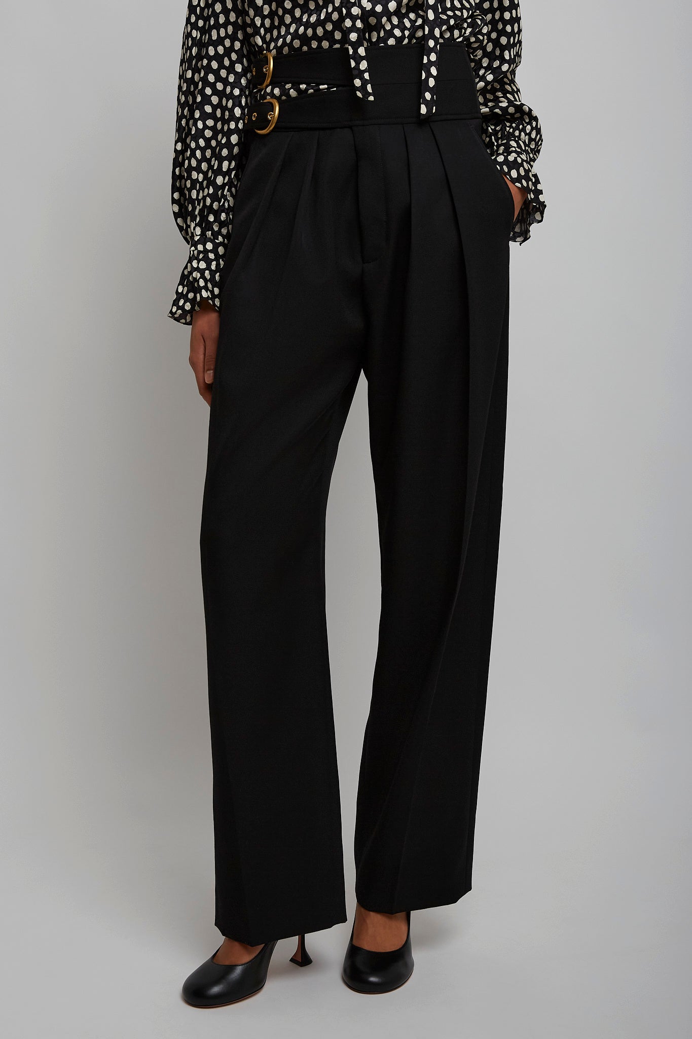 High-waist buckled black trousers