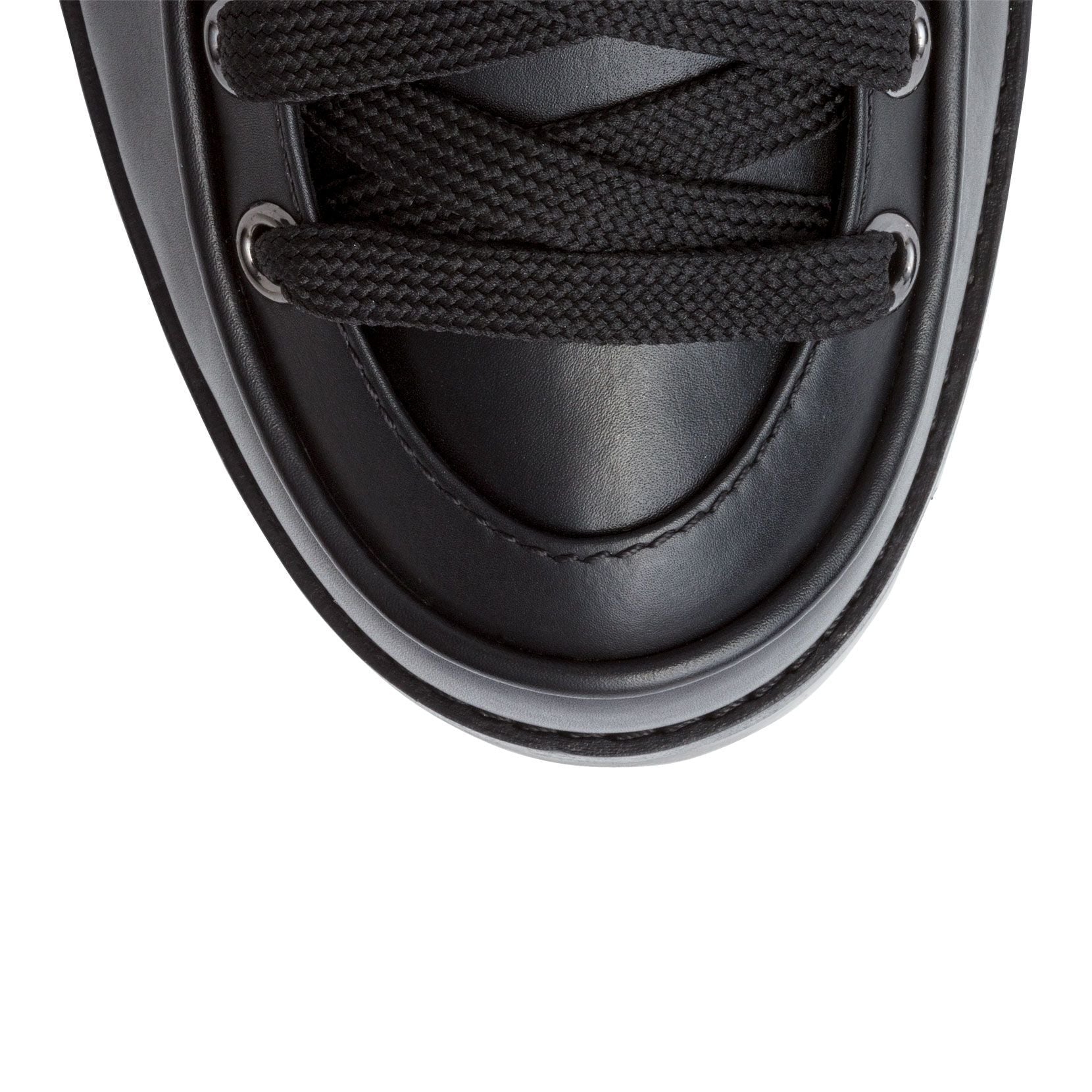 Who Runs black leather boots