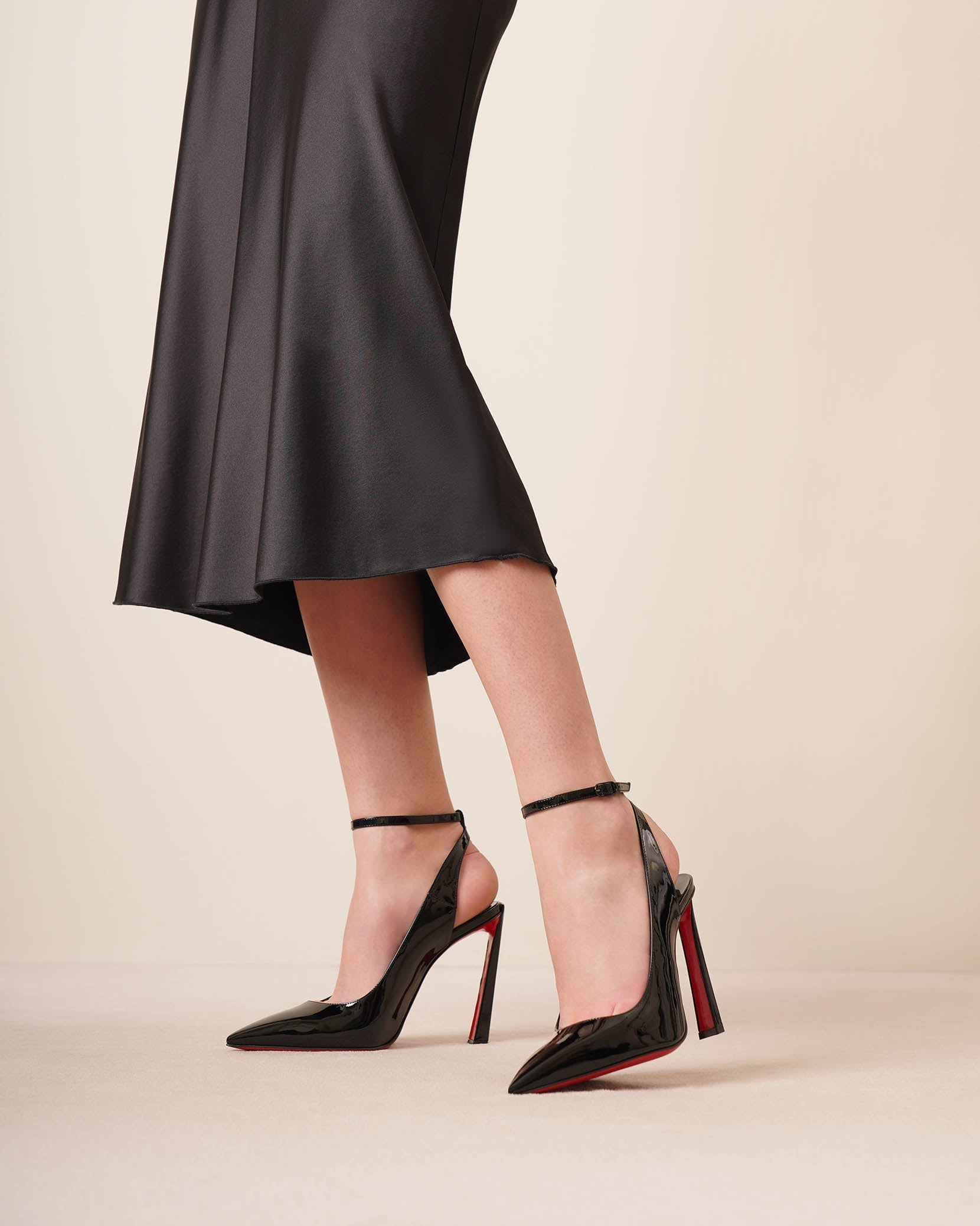 Condora 100 patent sling pumps