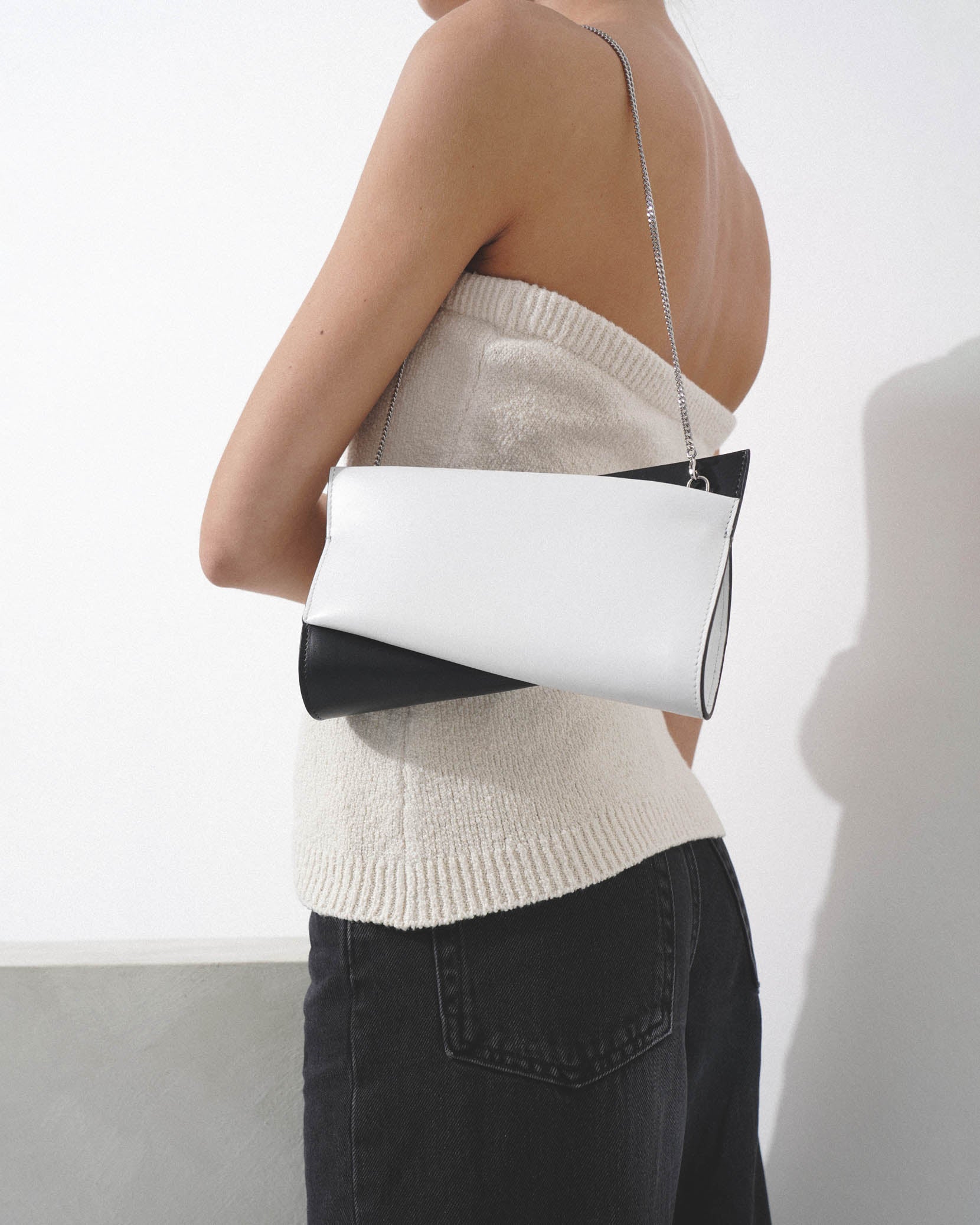 Loubitwist small black and white clutch bag