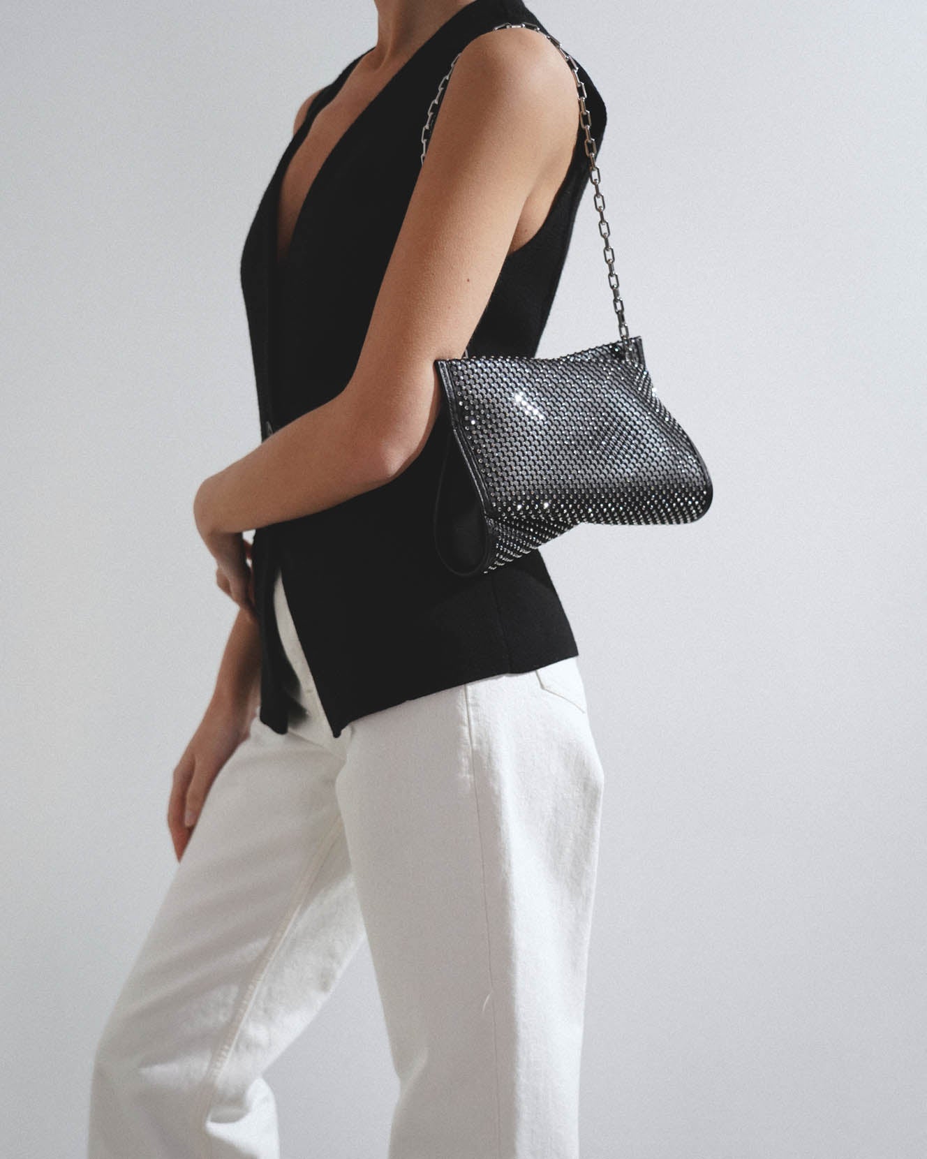 Loubitwist black strass clutch