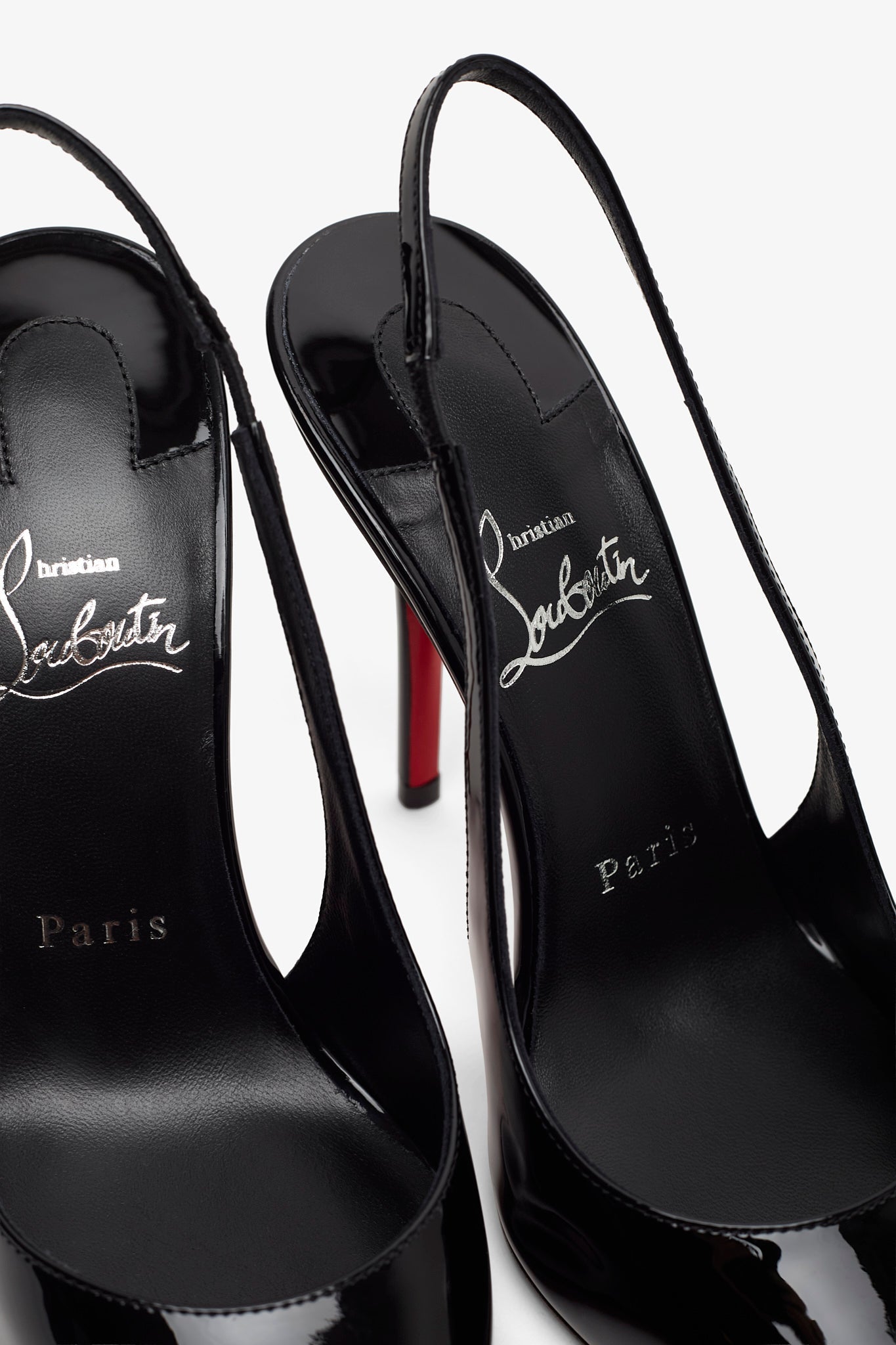 Miss Z 100 black patent slingback pumps