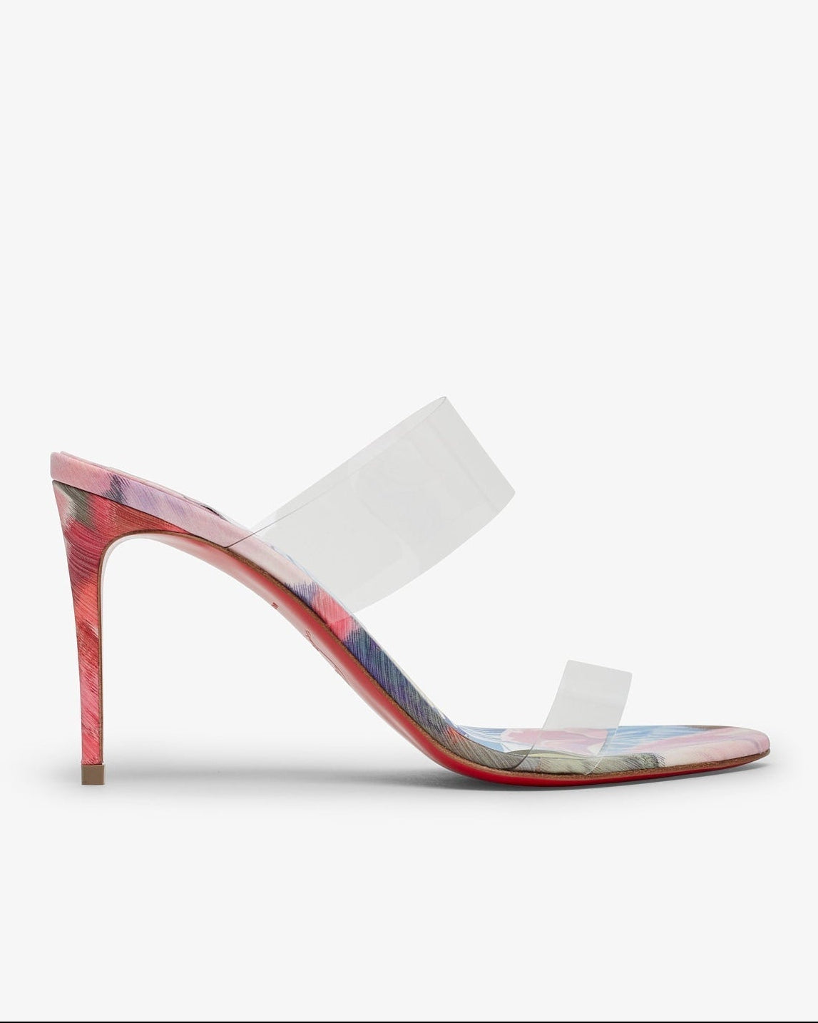 High-heeled shoe with a transparent strap on a white background
