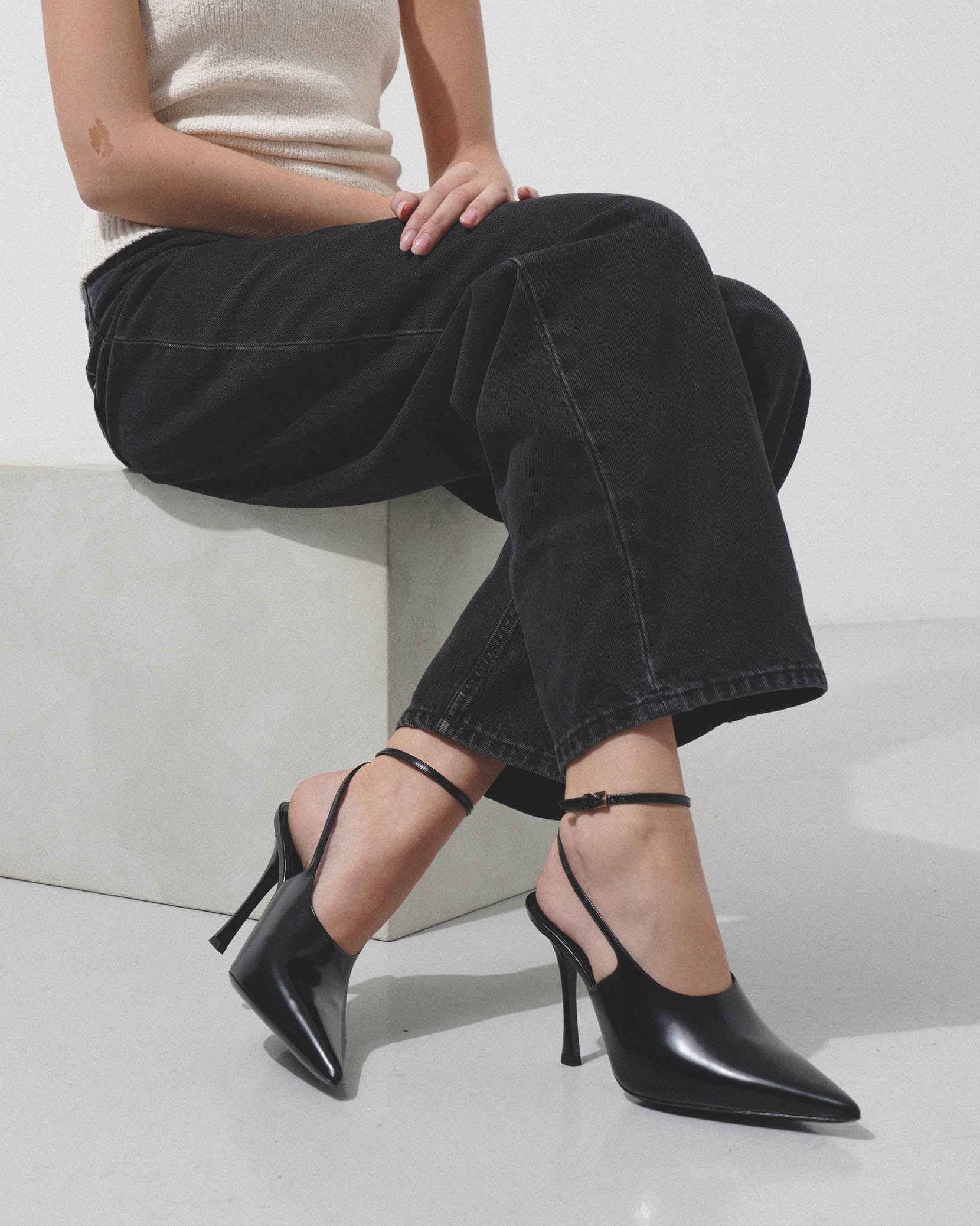 Show 95 black slingback pumps