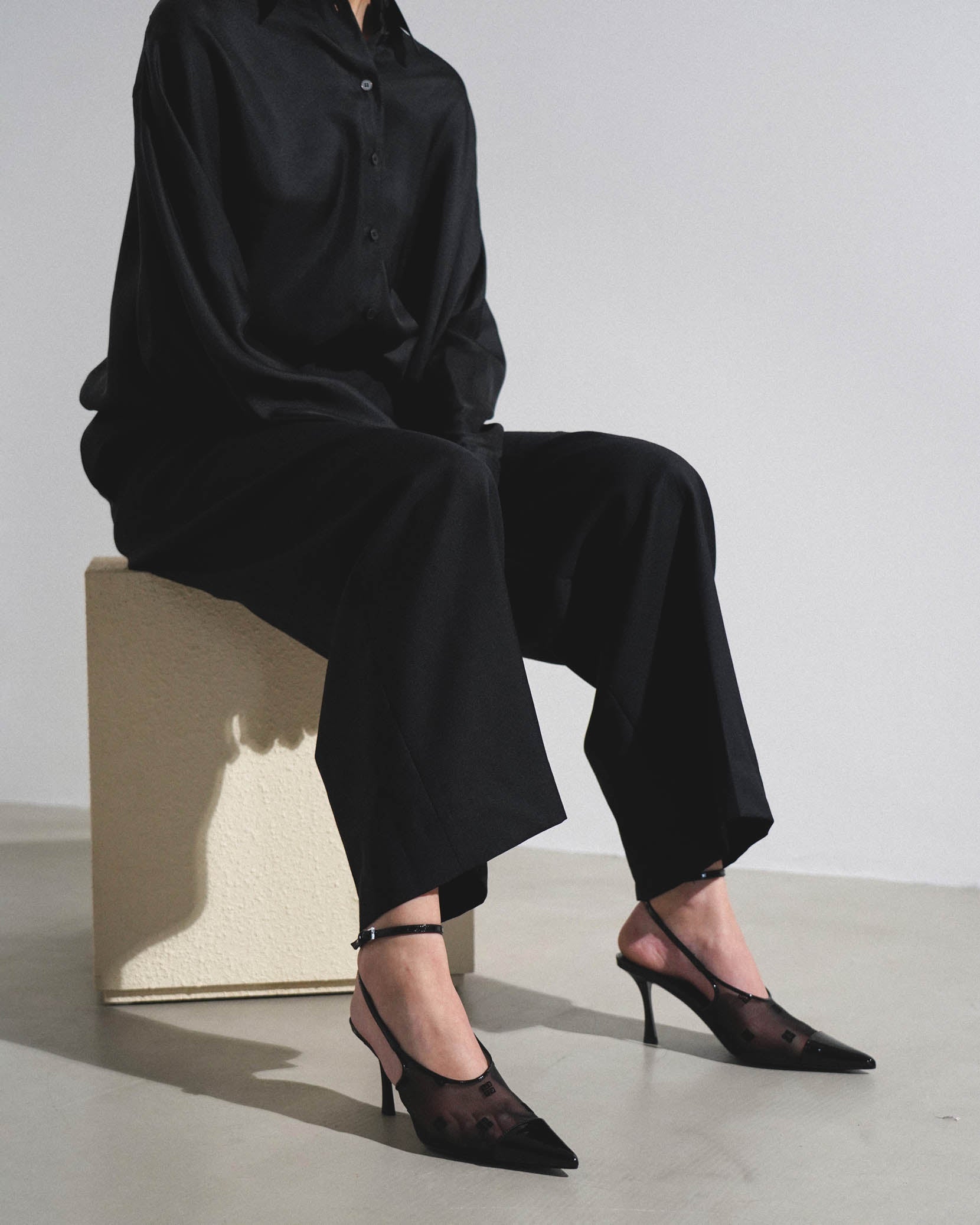 Show 75 black mesh slingbacks