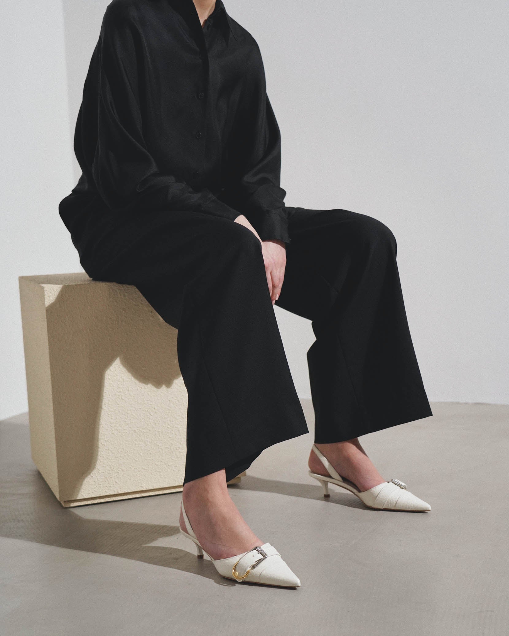 Voyou white slingbacks