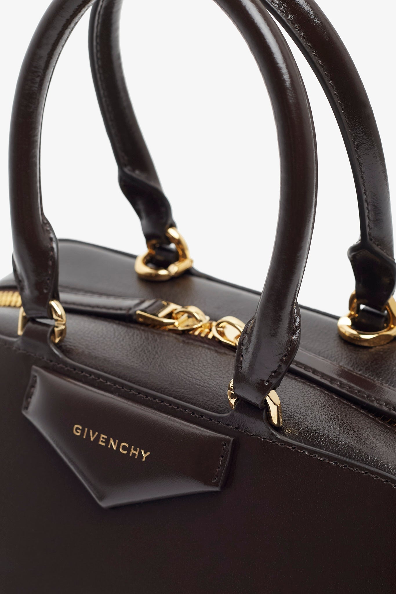 Antigona east west small brown bag