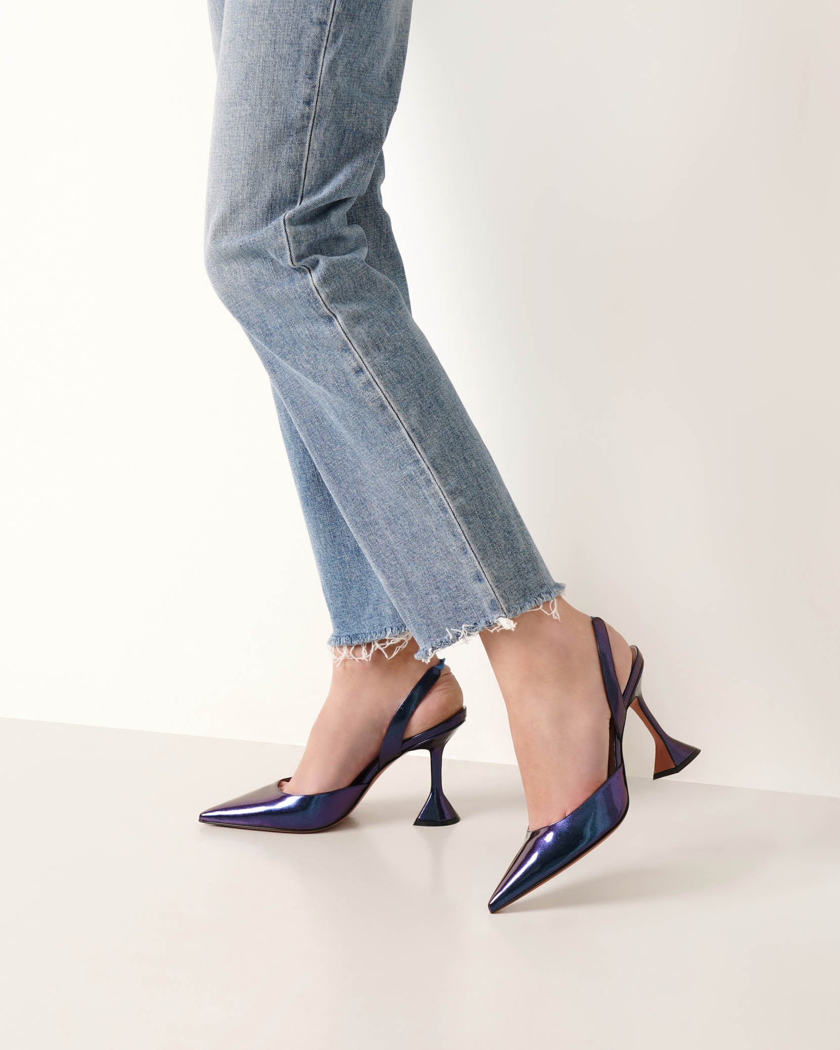 Holli sling patent metallic pumps