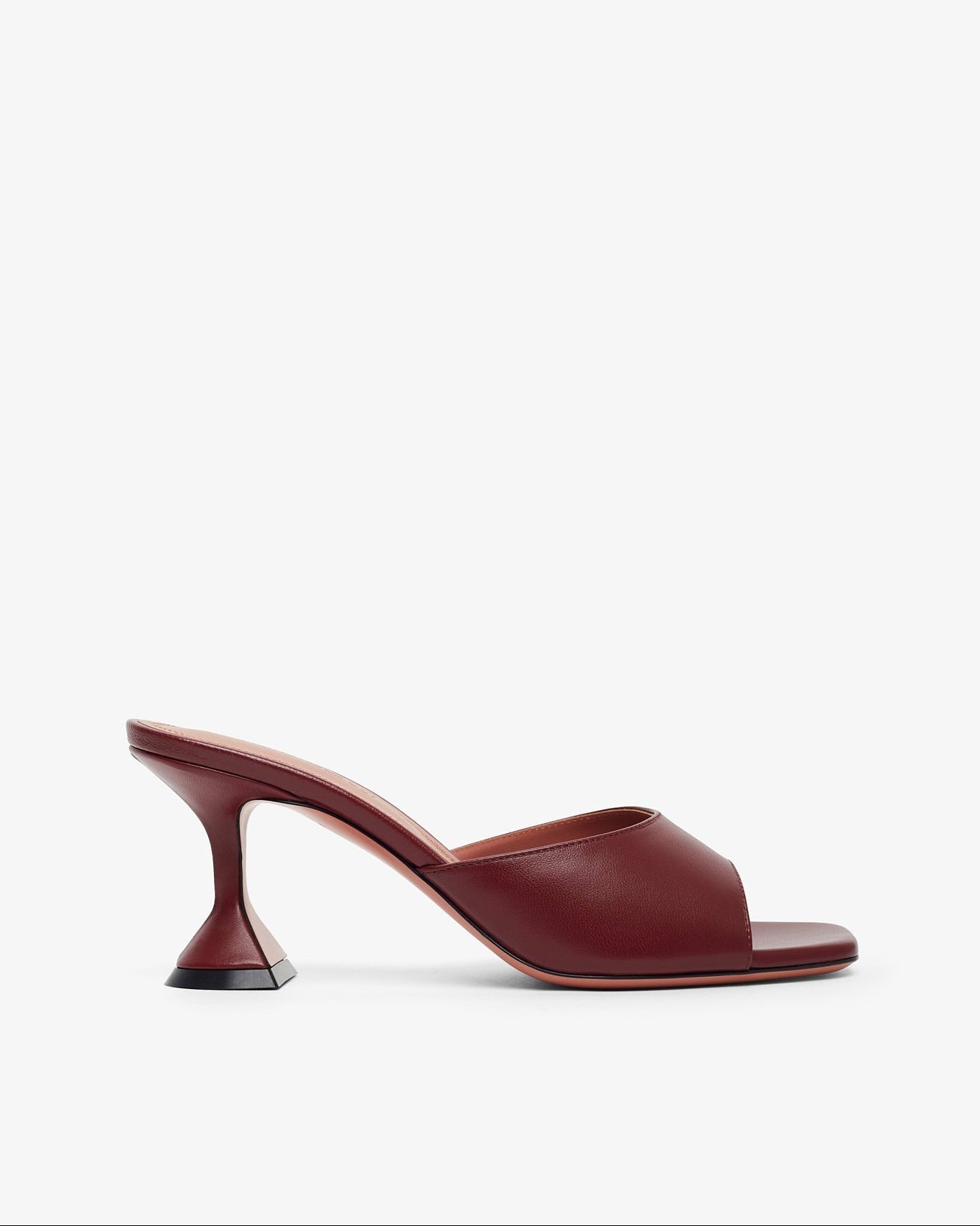 Brown high-heeled shoe on a white background