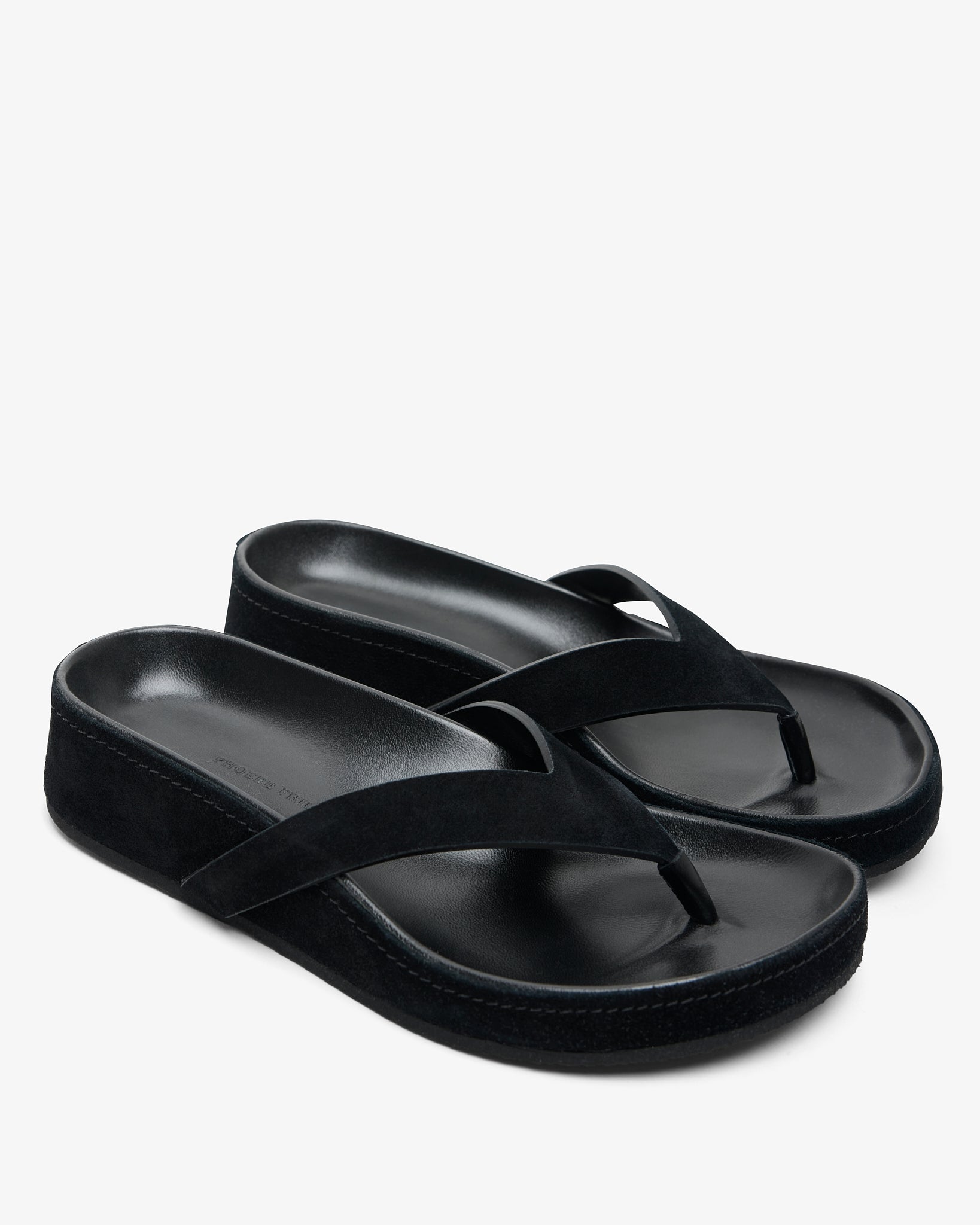 Round black flip flops