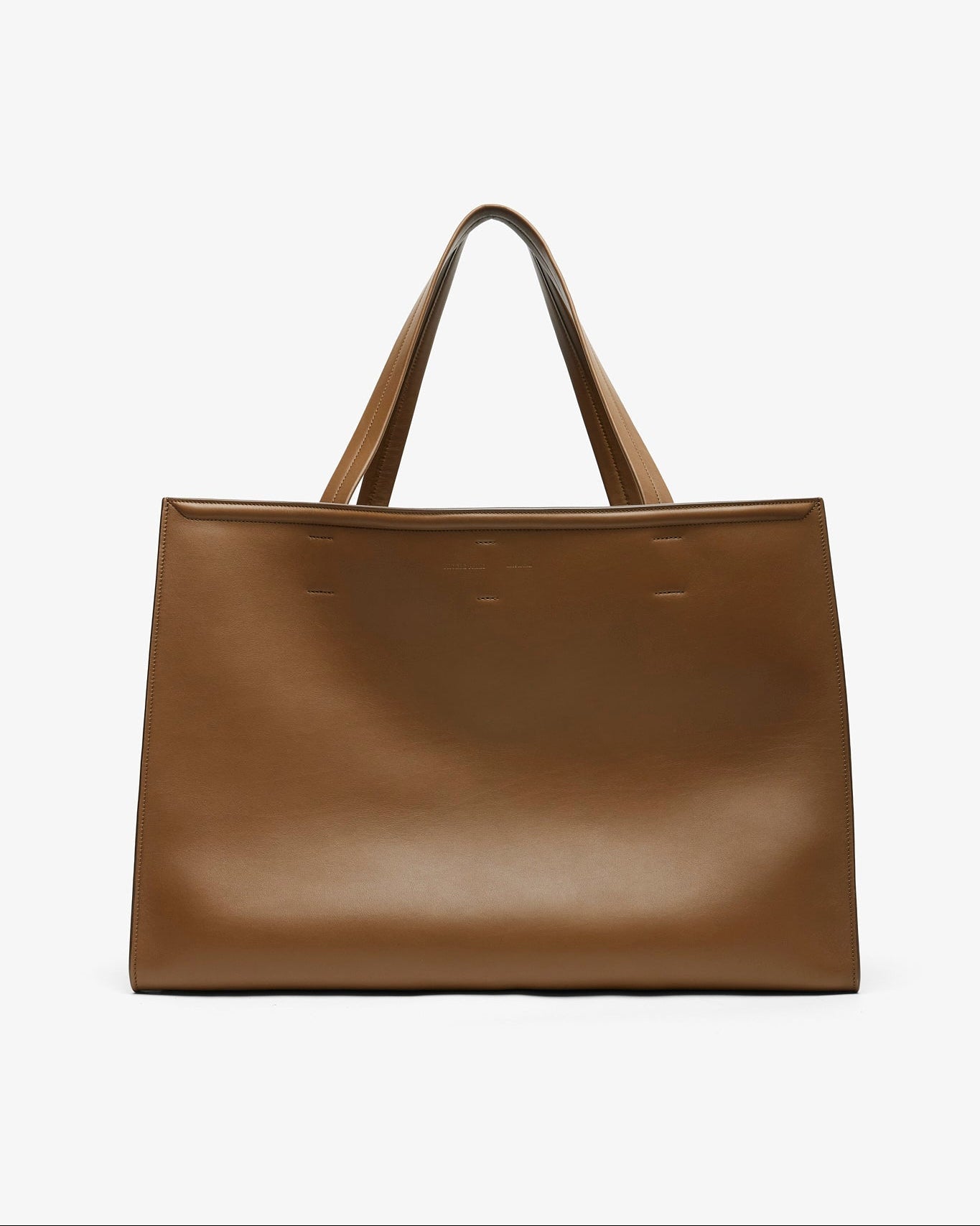 Brown leather tote bag on a white background