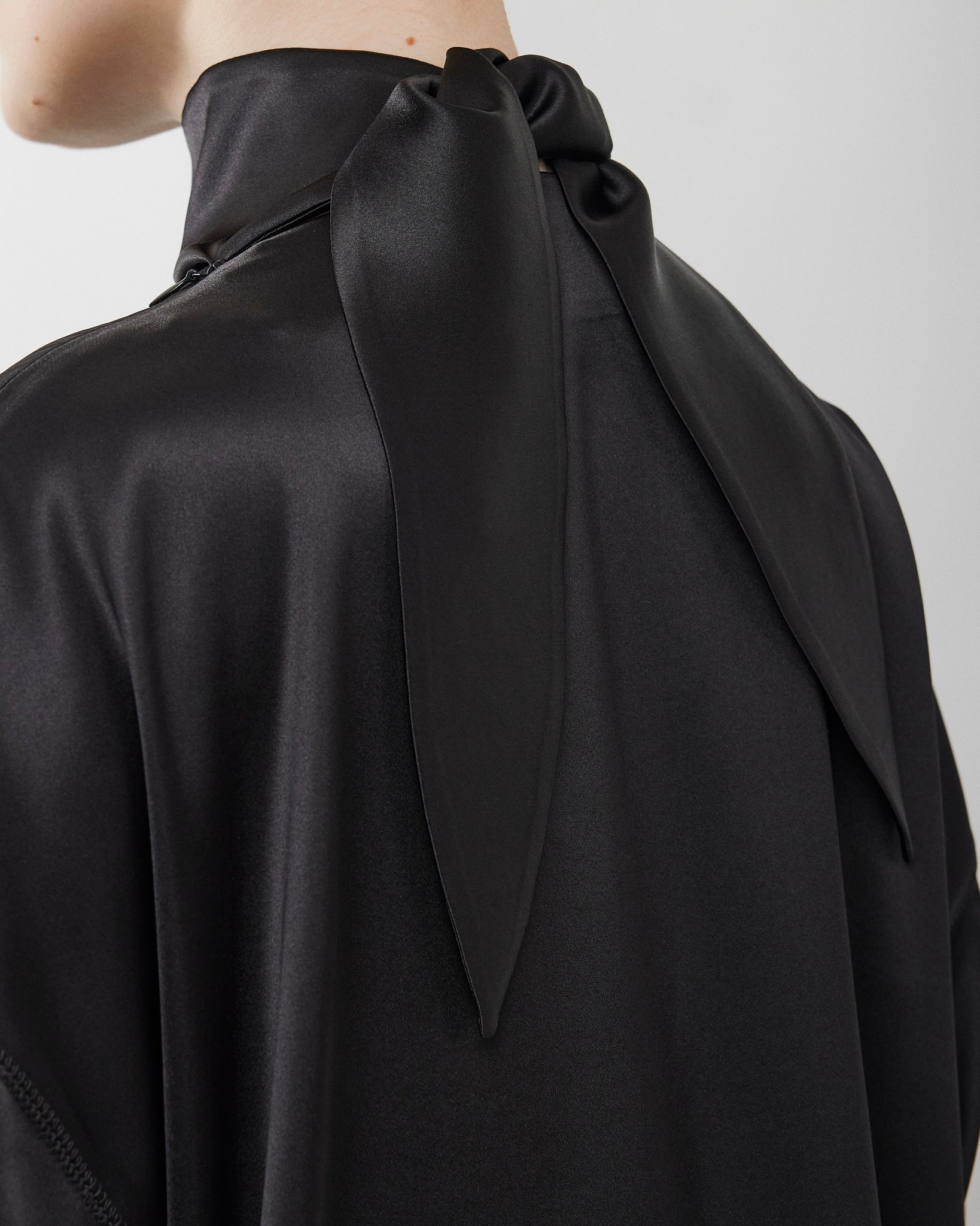 Liquid black knot collar top