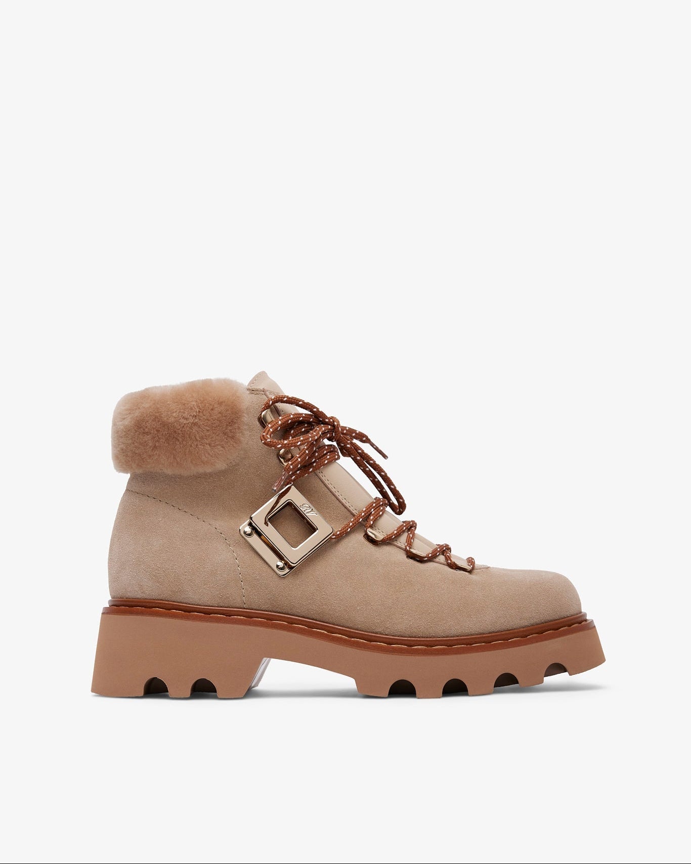 Beige boot with fur lining on a white background