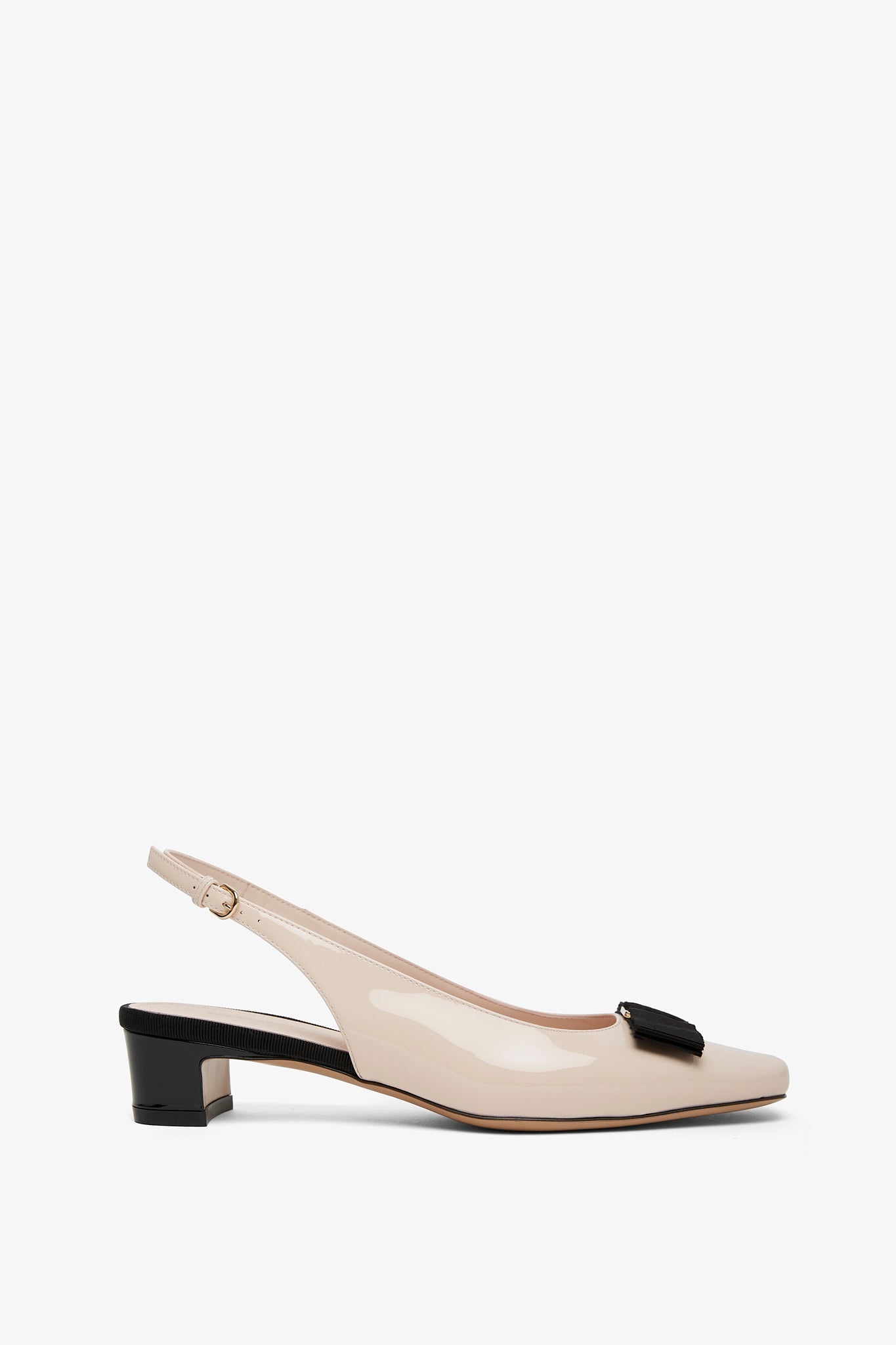 Iconic bow slingback pumps