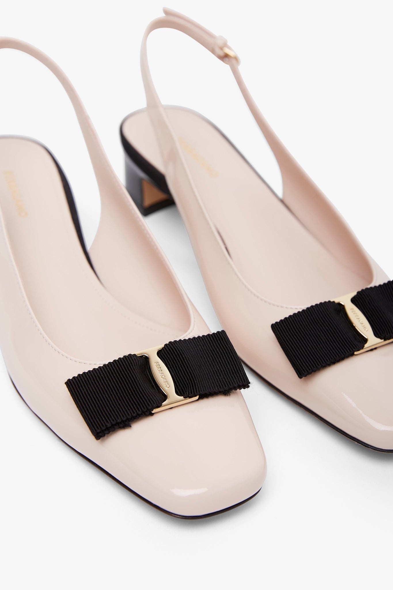 Iconic bow slingback pumps